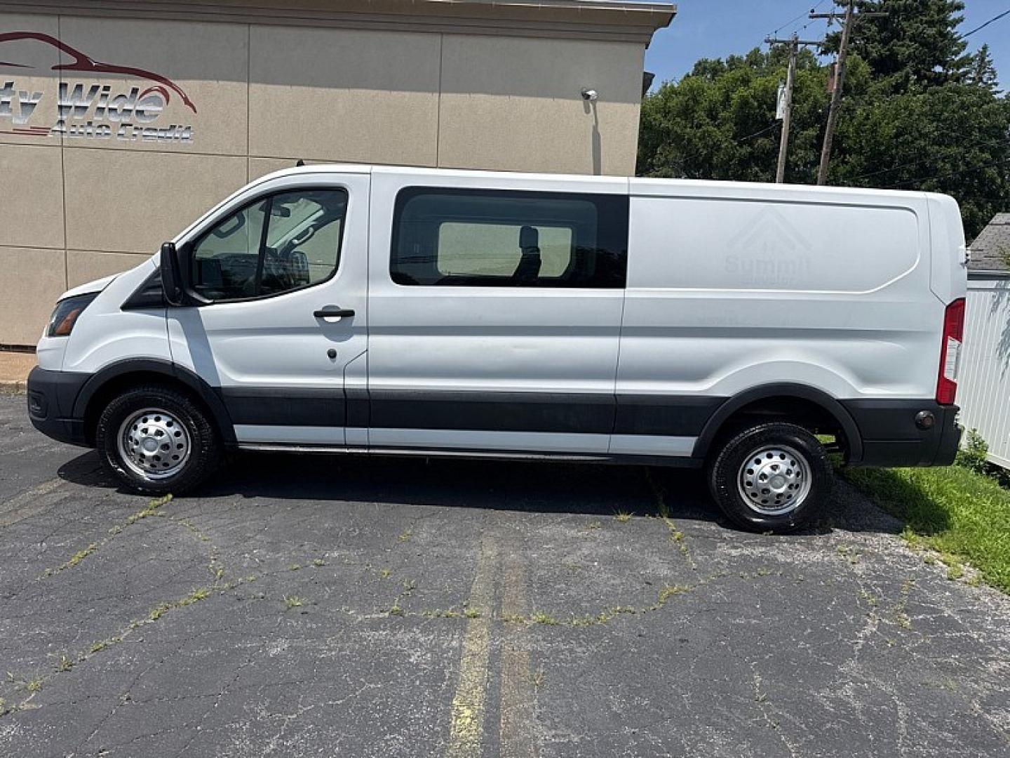2020 WHITE /BLACK Ford Transit 150 Van Low Roof 60/40 Pass. 130-in. WB (1FTYE1ZG7LK) with an 3.5L V6 DOHC 24V engine, 6A transmission, located at 3304 Woodville Road, Northwood, OH, 43619, (419) 210-8019, 41.612694, -83.480743 - Your #1 Destination for Auto Loans and mdash;No Matter Your Credit!At our dealership, we believe everyone deserves the opportunity to drive their dream car and mdash;whether you have good credit, bad credit, or no credit at all. With a wide selection of hundreds of cars, trucks, and SUVs, you'll fin- Photo#1