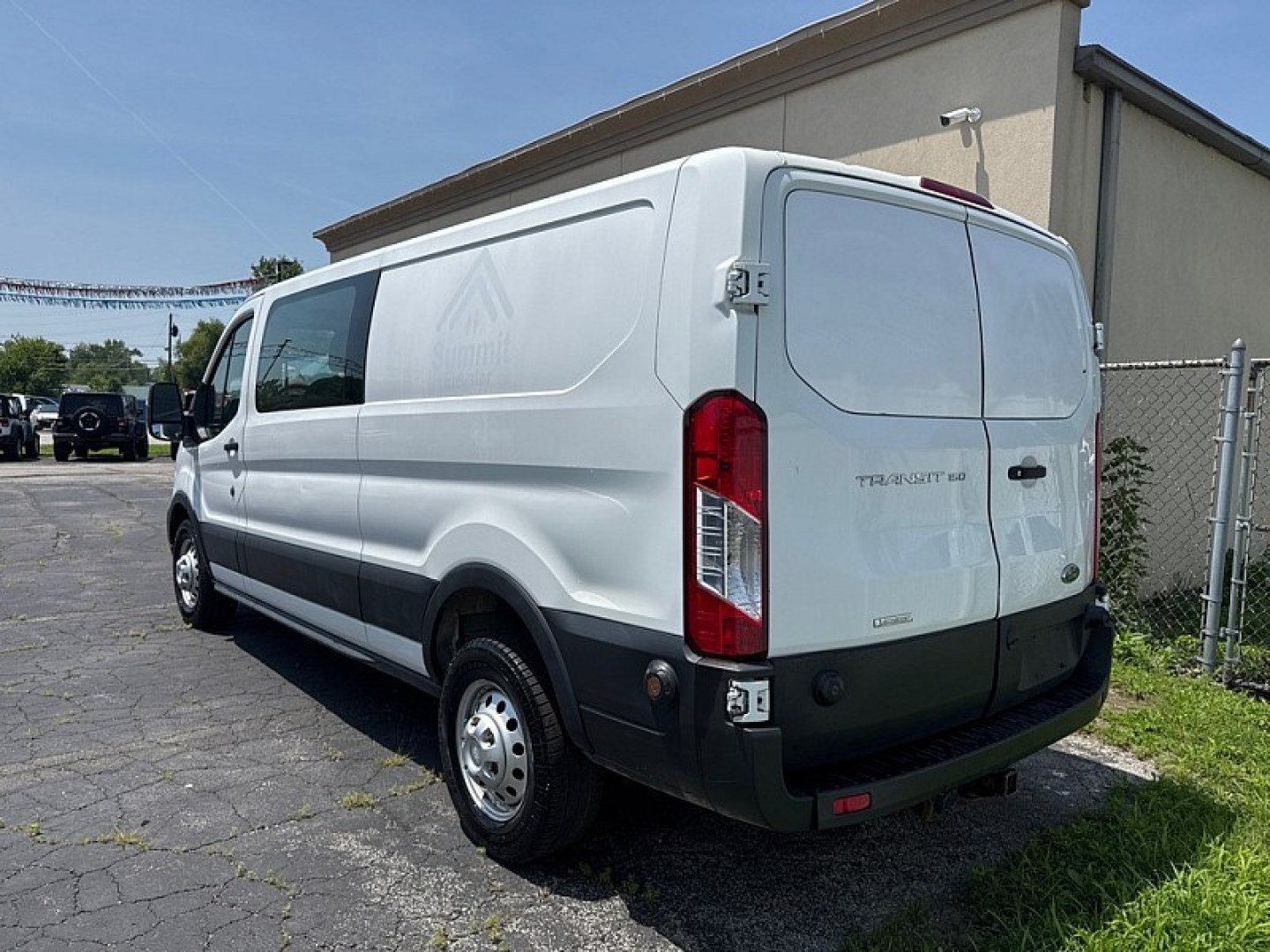 2020 WHITE /BLACK Ford Transit 150 Van Low Roof 60/40 Pass. 130-in. WB (1FTYE1ZG7LK) with an 3.5L V6 DOHC 24V engine, 6A transmission, located at 3304 Woodville Road, Northwood, OH, 43619, (419) 210-8019, 41.612694, -83.480743 - Your #1 Destination for Auto Loans and mdash;No Matter Your Credit!At our dealership, we believe everyone deserves the opportunity to drive their dream car and mdash;whether you have good credit, bad credit, or no credit at all. With a wide selection of hundreds of cars, trucks, and SUVs, you'll fin- Photo#2