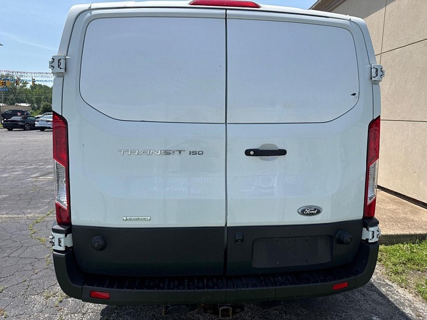 2020 WHITE /BLACK Ford Transit 150 Van Low Roof 60/40 Pass. 130-in. WB (1FTYE1ZG7LK) with an 3.5L V6 DOHC 24V engine, 6A transmission, located at 3304 Woodville Road, Northwood, OH, 43619, (419) 210-8019, 41.612694, -83.480743 - Your #1 Destination for Auto Loans and mdash;No Matter Your Credit!At our dealership, we believe everyone deserves the opportunity to drive their dream car and mdash;whether you have good credit, bad credit, or no credit at all. With a wide selection of hundreds of cars, trucks, and SUVs, you'll fin- Photo#3