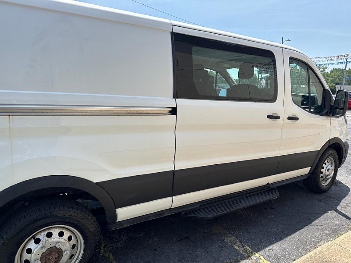 2020 WHITE /BLACK Ford Transit 150 Van Low Roof 60/40 Pass. 130-in. WB (1FTYE1ZG7LK) with an 3.5L V6 DOHC 24V engine, 6A transmission, located at 3304 Woodville Road, Northwood, OH, 43619, (419) 210-8019, 41.612694, -83.480743 - Your #1 Destination for Auto Loans and mdash;No Matter Your Credit!At our dealership, we believe everyone deserves the opportunity to drive their dream car and mdash;whether you have good credit, bad credit, or no credit at all. With a wide selection of hundreds of cars, trucks, and SUVs, you'll fin- Photo#5