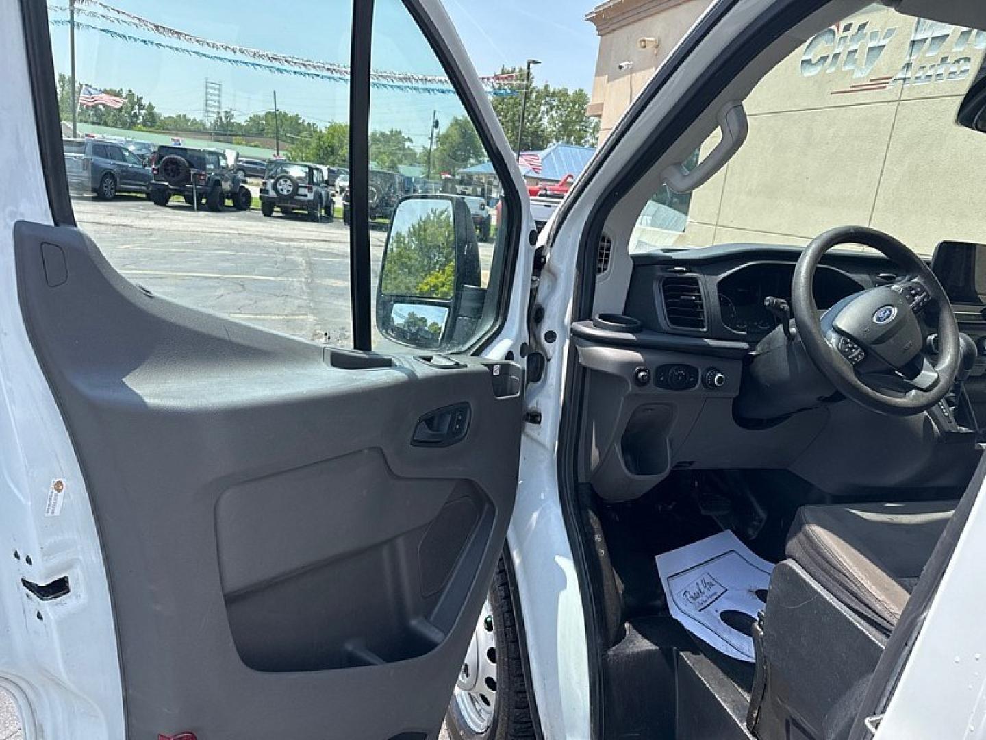 2020 WHITE /BLACK Ford Transit 150 Van Low Roof 60/40 Pass. 130-in. WB (1FTYE1ZG7LK) with an 3.5L V6 DOHC 24V engine, 6A transmission, located at 3304 Woodville Road, Northwood, OH, 43619, (419) 210-8019, 41.612694, -83.480743 - Your #1 Destination for Auto Loans and mdash;No Matter Your Credit!At our dealership, we believe everyone deserves the opportunity to drive their dream car and mdash;whether you have good credit, bad credit, or no credit at all. With a wide selection of hundreds of cars, trucks, and SUVs, you'll fin- Photo#8
