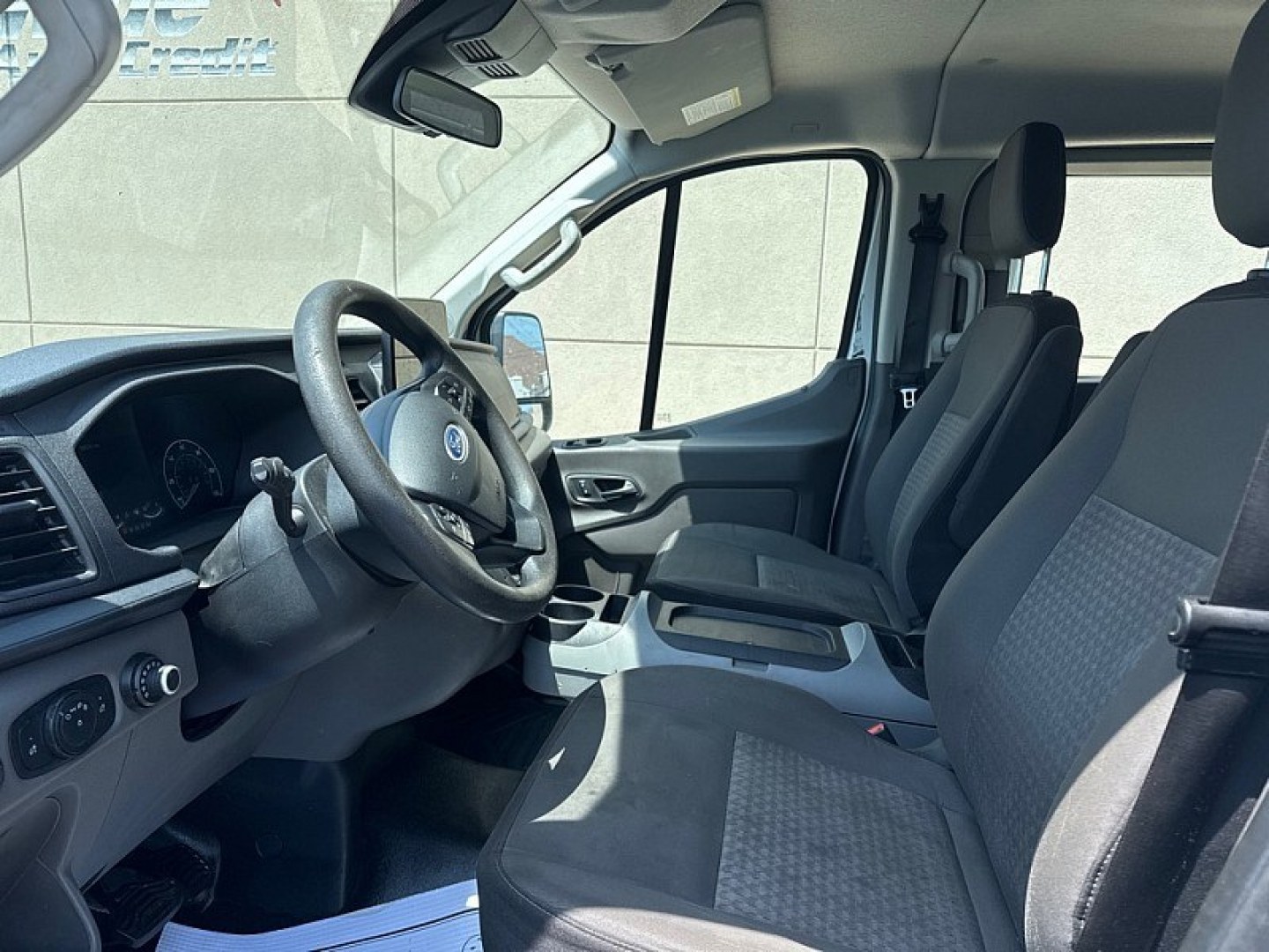2020 WHITE /BLACK Ford Transit 150 Van Low Roof 60/40 Pass. 130-in. WB (1FTYE1ZG7LK) with an 3.5L V6 DOHC 24V engine, 6A transmission, located at 3304 Woodville Road, Northwood, OH, 43619, (419) 210-8019, 41.612694, -83.480743 - Your #1 Destination for Auto Loans and mdash;No Matter Your Credit!At our dealership, we believe everyone deserves the opportunity to drive their dream car and mdash;whether you have good credit, bad credit, or no credit at all. With a wide selection of hundreds of cars, trucks, and SUVs, you'll fin- Photo#9