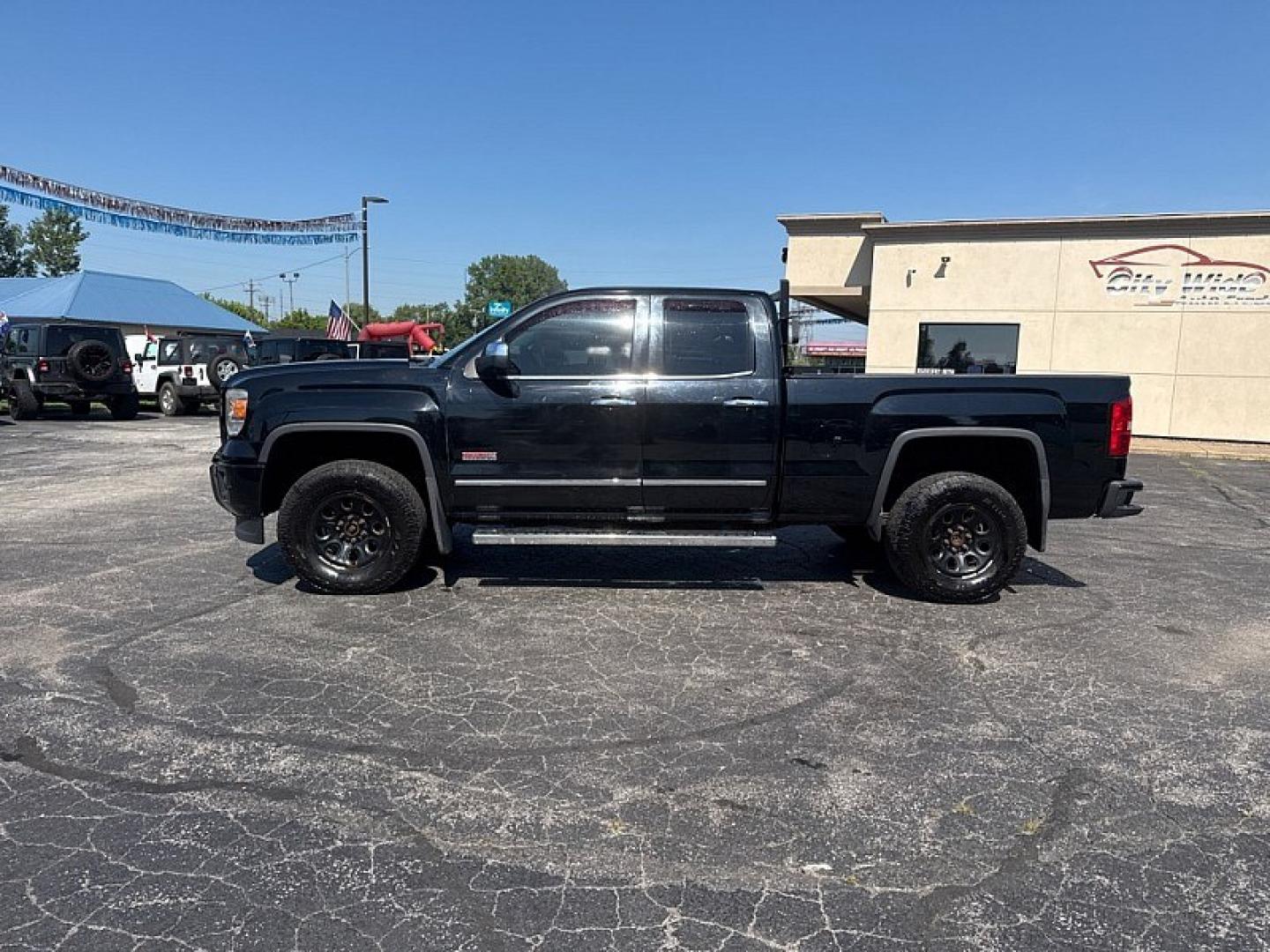 2013 BLACK /BLACK GMC Sierra 1500 SLT Ext. Cab 4WD (1GTV2VEC3EZ) with an 5.3L V8 OHV 16V engine, 6-Speed Automatic transmission, located at 3304 Woodville Road, Northwood, OH, 43619, (419) 210-8019, 41.612694, -83.480743- Photo#1