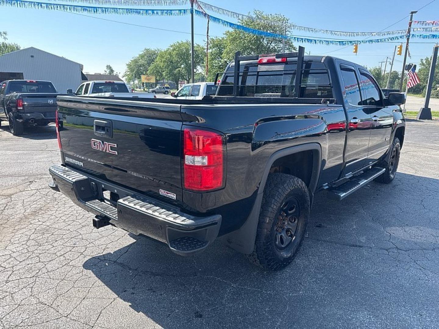 2013 BLACK /BLACK GMC Sierra 1500 SLT Ext. Cab 4WD (1GTV2VEC3EZ) with an 5.3L V8 OHV 16V engine, 6-Speed Automatic transmission, located at 3304 Woodville Road, Northwood, OH, 43619, (419) 210-8019, 41.612694, -83.480743- Photo#4