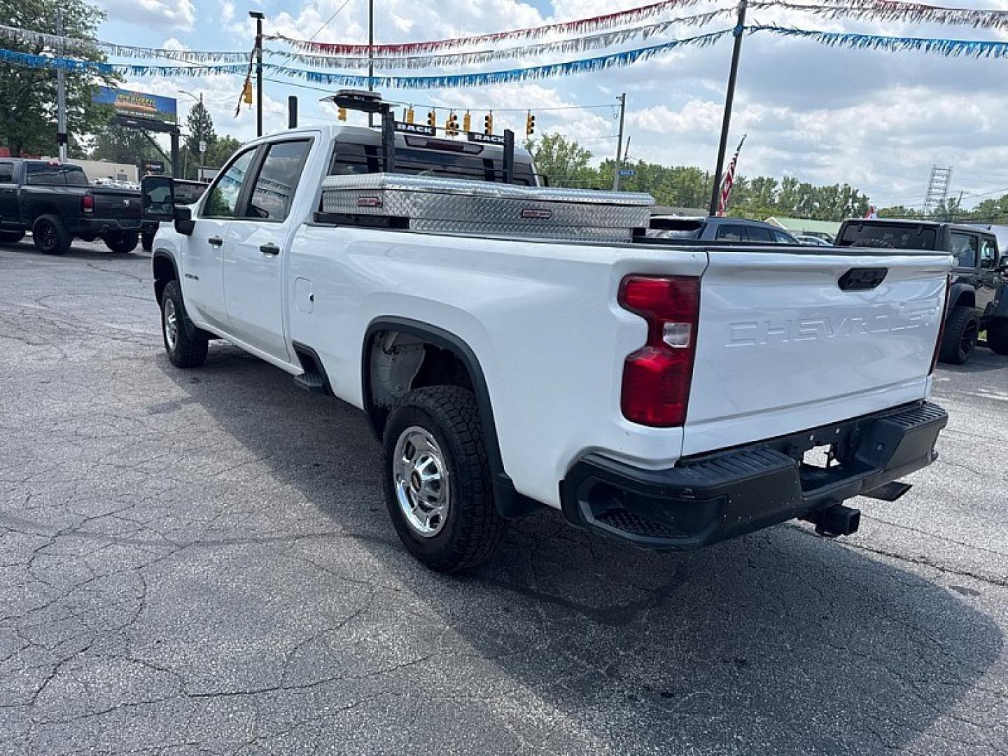 2021 WHITE /BLACK Chevrolet Silverado 2500HD Work Truck Crew Cab Short Box 2WD (1GC1WLE72MF) with an 6.6L V8 OHV 16V engine, 6A transmission, located at 3304 Woodville Road, Northwood, OH, 43619, (419) 210-8019, 41.612694, -83.480743 - Your #1 Destination for Auto Loans and mdash;No Matter Your Credit!At our dealership, we believe everyone deserves the opportunity to drive their dream car and mdash;whether you have good credit, bad credit, or no credit at all. With a wide selection of hundreds of cars, trucks, and SUVs, you'll fin- Photo#2