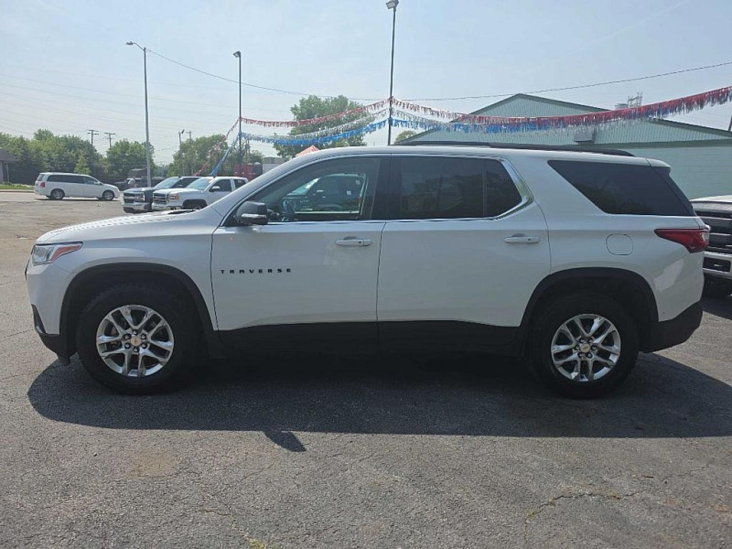 2020 WHITE /BLACK Chevrolet Traverse LT Cloth AWD (1GNEVGKW5LJ) with an 3.6L V6 DOHC 24V engine, 9A transmission, located at 3304 Woodville Road, Northwood, OH, 43619, (419) 210-8019, 41.612694, -83.480743 - Your #1 Destination for Auto Loans and mdash;No Matter Your Credit!At our dealership, we believe everyone deserves the opportunity to drive their dream car and mdash;whether you have good credit, bad credit, or no credit at all. With a wide selection of hundreds of cars, trucks, and SUVs, you'll fin- Photo#1