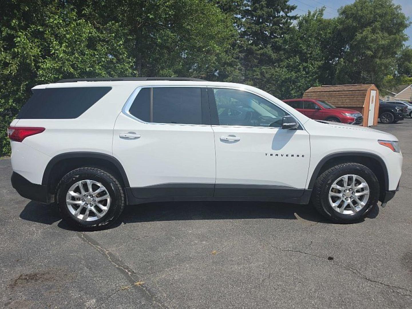 2020 WHITE /BLACK Chevrolet Traverse LT Cloth AWD (1GNEVGKW5LJ) with an 3.6L V6 DOHC 24V engine, 9A transmission, located at 3304 Woodville Road, Northwood, OH, 43619, (419) 210-8019, 41.612694, -83.480743 - Your #1 Destination for Auto Loans and mdash;No Matter Your Credit!At our dealership, we believe everyone deserves the opportunity to drive their dream car and mdash;whether you have good credit, bad credit, or no credit at all. With a wide selection of hundreds of cars, trucks, and SUVs, you'll fin- Photo#5