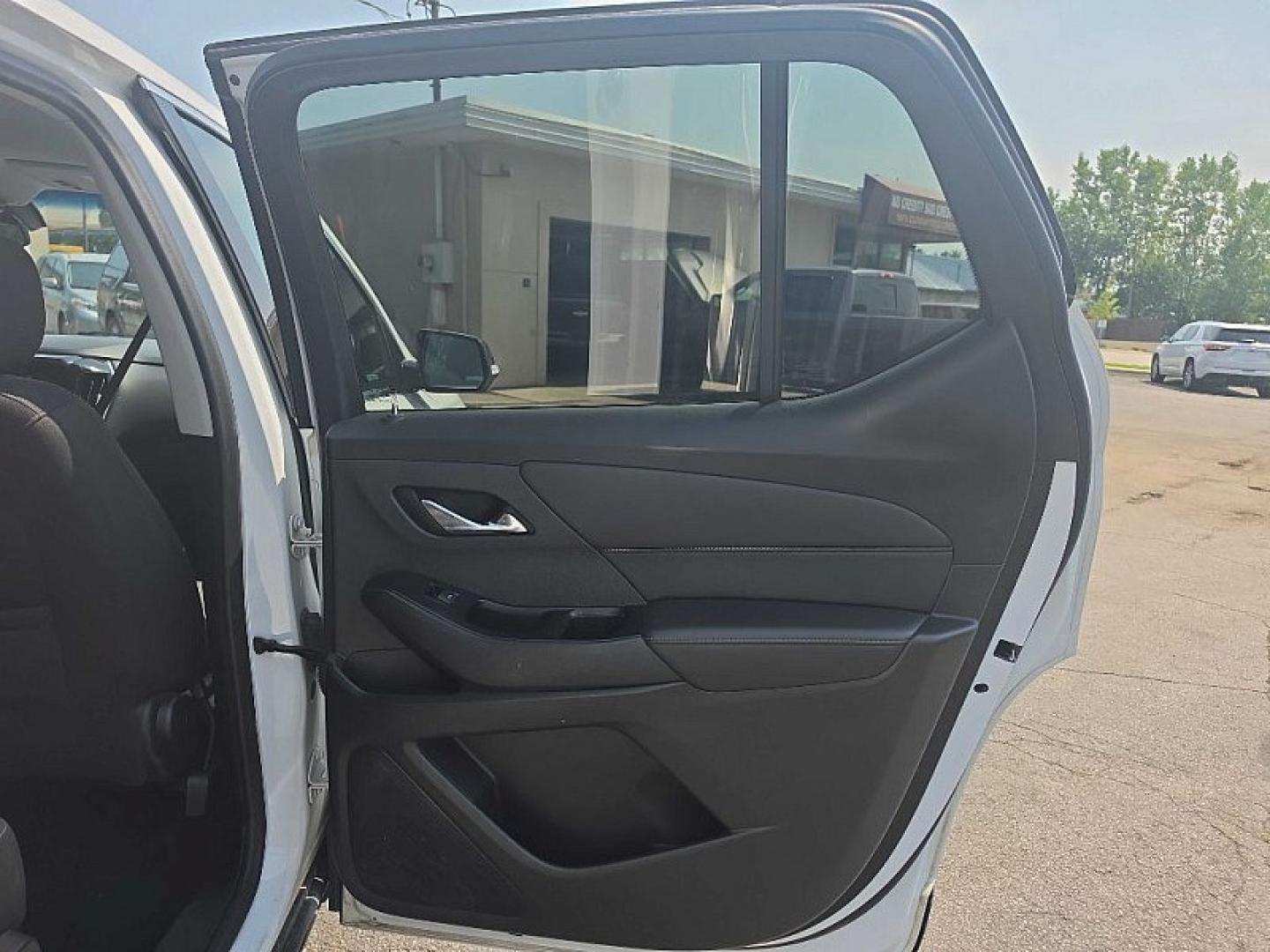2020 WHITE /BLACK Chevrolet Traverse LT Cloth AWD (1GNEVGKW5LJ) with an 3.6L V6 DOHC 24V engine, 9A transmission, located at 3304 Woodville Road, Northwood, OH, 43619, (419) 210-8019, 41.612694, -83.480743 - Your #1 Destination for Auto Loans and mdash;No Matter Your Credit!At our dealership, we believe everyone deserves the opportunity to drive their dream car and mdash;whether you have good credit, bad credit, or no credit at all. With a wide selection of hundreds of cars, trucks, and SUVs, you'll fin- Photo#14