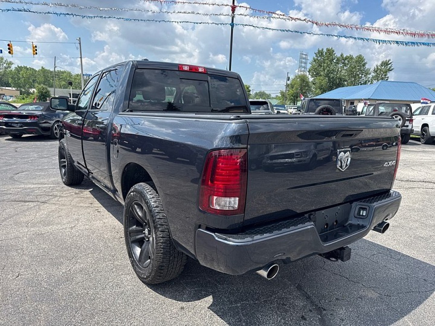 2016 GRAY /BLACK RAM 1500 Sport Crew Cab SWB 4WD (1C6RR7MT2GS) with an 5.7L V8 OHV 16V engine, 6A transmission, located at 3304 Woodville Road, Northwood, OH, 43619, (419) 210-8019, 41.612694, -83.480743 - Your #1 Destination for Auto Loans and mdash;No Matter Your Credit!At our dealership, we believe everyone deserves the opportunity to drive their dream car and mdash;whether you have good credit, bad credit, or no credit at all. With a wide selection of hundreds of cars, trucks, and SUVs, you'll fin- Photo#2