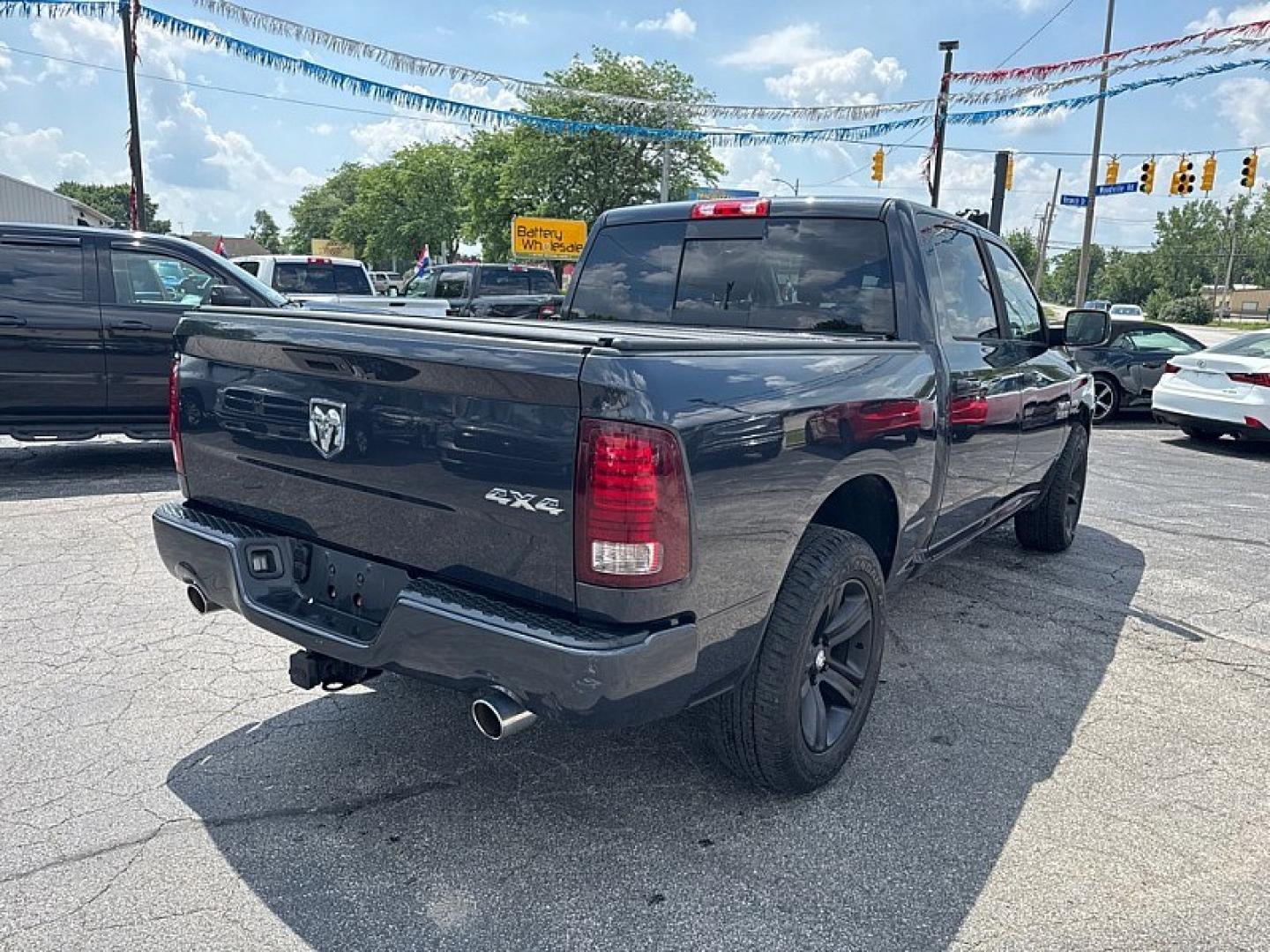 2016 GRAY /BLACK RAM 1500 Sport Crew Cab SWB 4WD (1C6RR7MT2GS) with an 5.7L V8 OHV 16V engine, 6A transmission, located at 3304 Woodville Road, Northwood, OH, 43619, (419) 210-8019, 41.612694, -83.480743 - Your #1 Destination for Auto Loans and mdash;No Matter Your Credit!At our dealership, we believe everyone deserves the opportunity to drive their dream car and mdash;whether you have good credit, bad credit, or no credit at all. With a wide selection of hundreds of cars, trucks, and SUVs, you'll fin- Photo#4