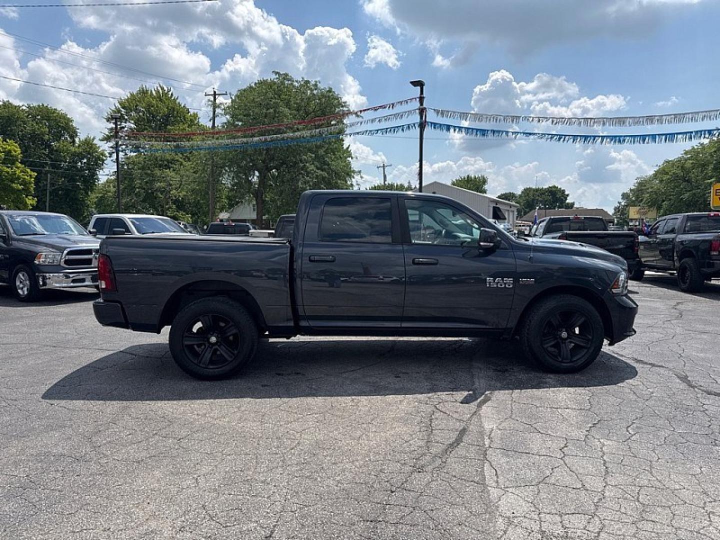 2016 GRAY /BLACK RAM 1500 Sport Crew Cab SWB 4WD (1C6RR7MT2GS) with an 5.7L V8 OHV 16V engine, 6A transmission, located at 3304 Woodville Road, Northwood, OH, 43619, (419) 210-8019, 41.612694, -83.480743 - Your #1 Destination for Auto Loans and mdash;No Matter Your Credit!At our dealership, we believe everyone deserves the opportunity to drive their dream car and mdash;whether you have good credit, bad credit, or no credit at all. With a wide selection of hundreds of cars, trucks, and SUVs, you'll fin- Photo#5
