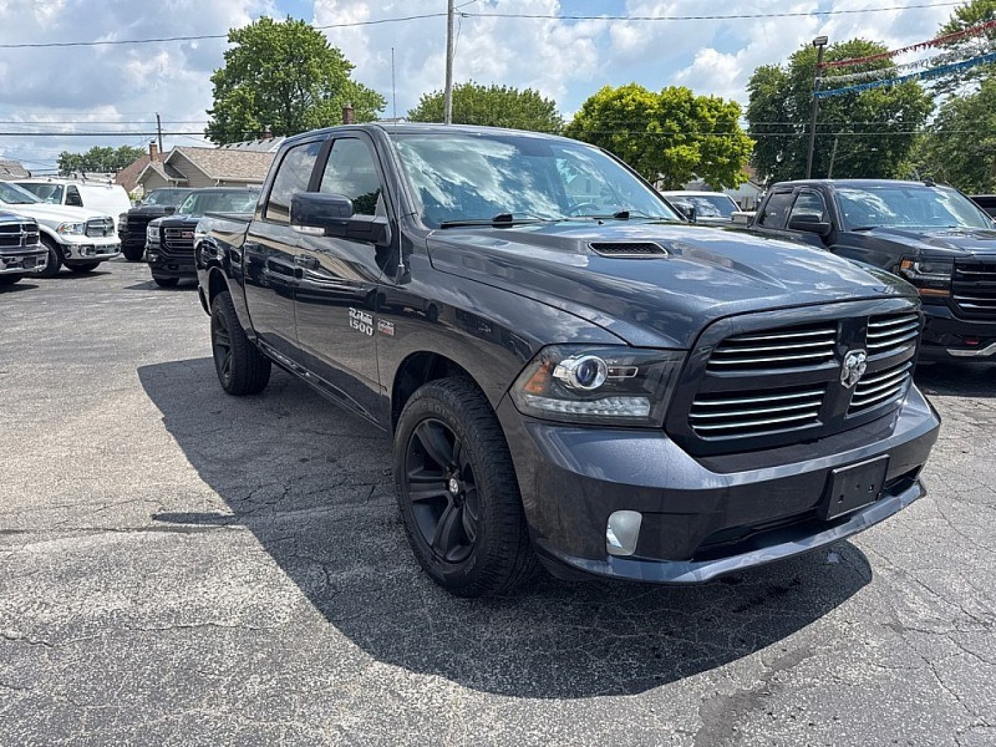 2016 GRAY /BLACK RAM 1500 Sport Crew Cab SWB 4WD (1C6RR7MT2GS) with an 5.7L V8 OHV 16V engine, 6A transmission, located at 3304 Woodville Road, Northwood, OH, 43619, (419) 210-8019, 41.612694, -83.480743 - Your #1 Destination for Auto Loans and mdash;No Matter Your Credit!At our dealership, we believe everyone deserves the opportunity to drive their dream car and mdash;whether you have good credit, bad credit, or no credit at all. With a wide selection of hundreds of cars, trucks, and SUVs, you'll fin- Photo#6