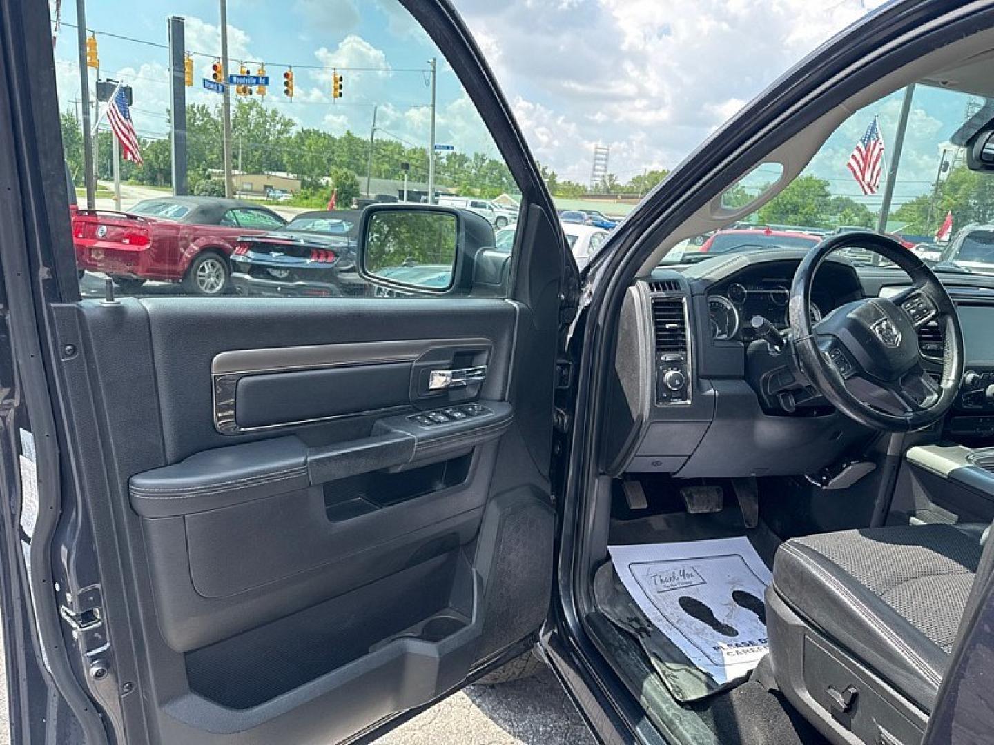 2016 GRAY /BLACK RAM 1500 Sport Crew Cab SWB 4WD (1C6RR7MT2GS) with an 5.7L V8 OHV 16V engine, 6A transmission, located at 3304 Woodville Road, Northwood, OH, 43619, (419) 210-8019, 41.612694, -83.480743 - Your #1 Destination for Auto Loans and mdash;No Matter Your Credit!At our dealership, we believe everyone deserves the opportunity to drive their dream car and mdash;whether you have good credit, bad credit, or no credit at all. With a wide selection of hundreds of cars, trucks, and SUVs, you'll fin- Photo#8