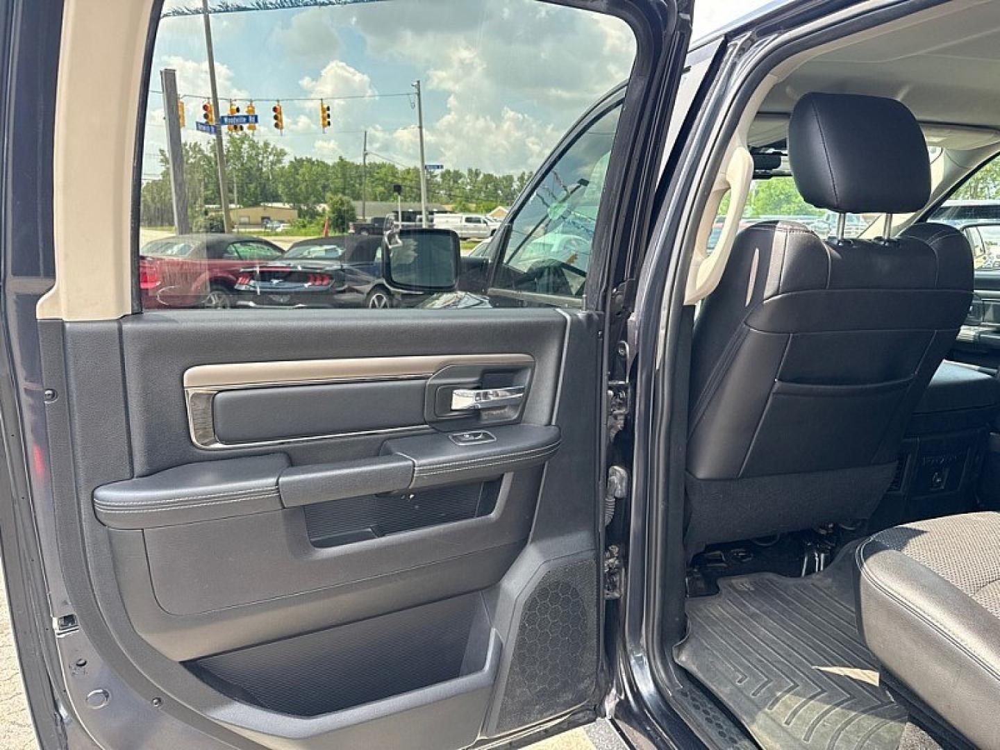 2016 GRAY /BLACK RAM 1500 Sport Crew Cab SWB 4WD (1C6RR7MT2GS) with an 5.7L V8 OHV 16V engine, 6A transmission, located at 3304 Woodville Road, Northwood, OH, 43619, (419) 210-8019, 41.612694, -83.480743 - Your #1 Destination for Auto Loans and mdash;No Matter Your Credit!At our dealership, we believe everyone deserves the opportunity to drive their dream car and mdash;whether you have good credit, bad credit, or no credit at all. With a wide selection of hundreds of cars, trucks, and SUVs, you'll fin- Photo#10