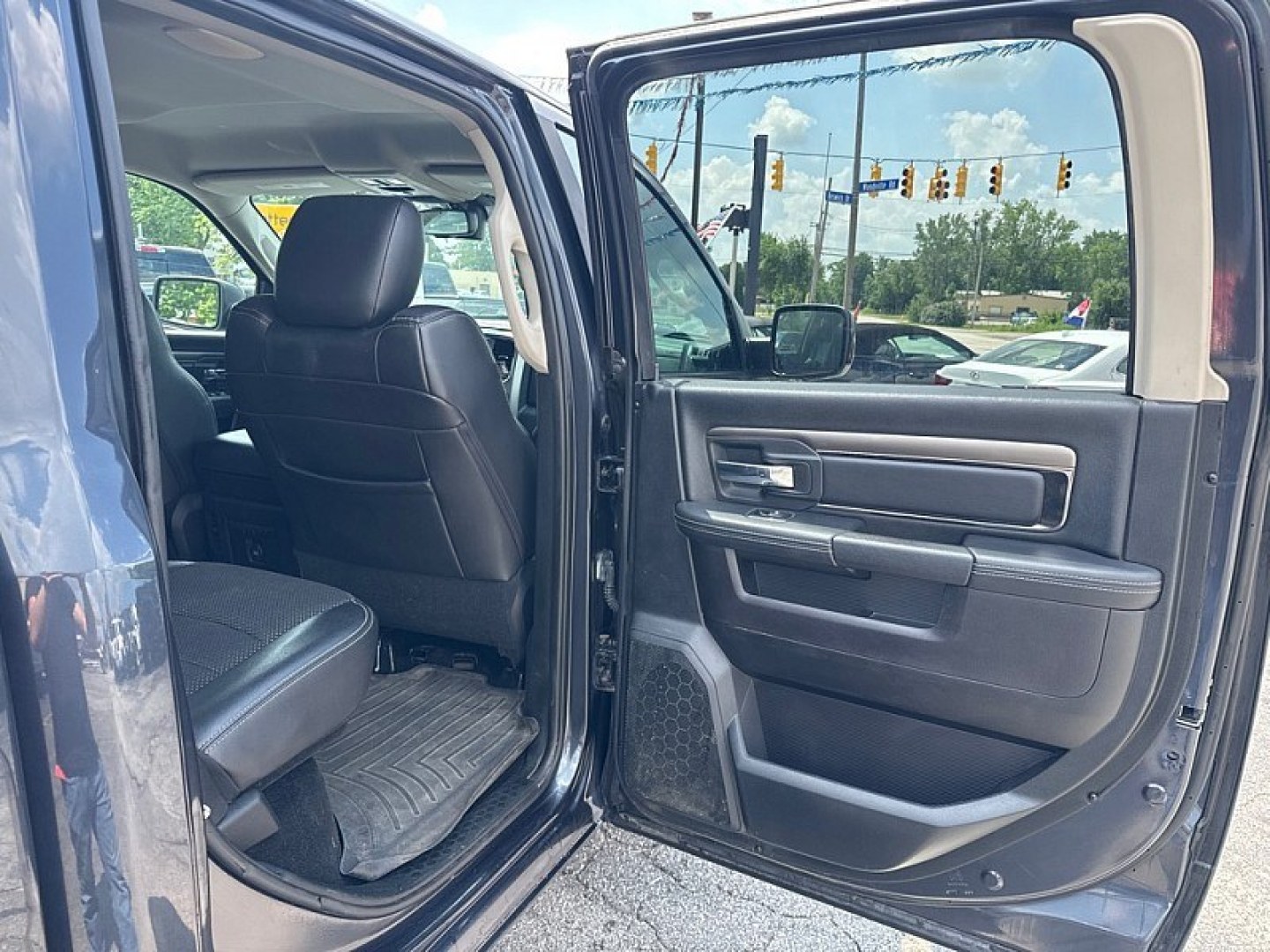 2016 GRAY /BLACK RAM 1500 Sport Crew Cab SWB 4WD (1C6RR7MT2GS) with an 5.7L V8 OHV 16V engine, 6A transmission, located at 3304 Woodville Road, Northwood, OH, 43619, (419) 210-8019, 41.612694, -83.480743 - Your #1 Destination for Auto Loans and mdash;No Matter Your Credit!At our dealership, we believe everyone deserves the opportunity to drive their dream car and mdash;whether you have good credit, bad credit, or no credit at all. With a wide selection of hundreds of cars, trucks, and SUVs, you'll fin- Photo#13
