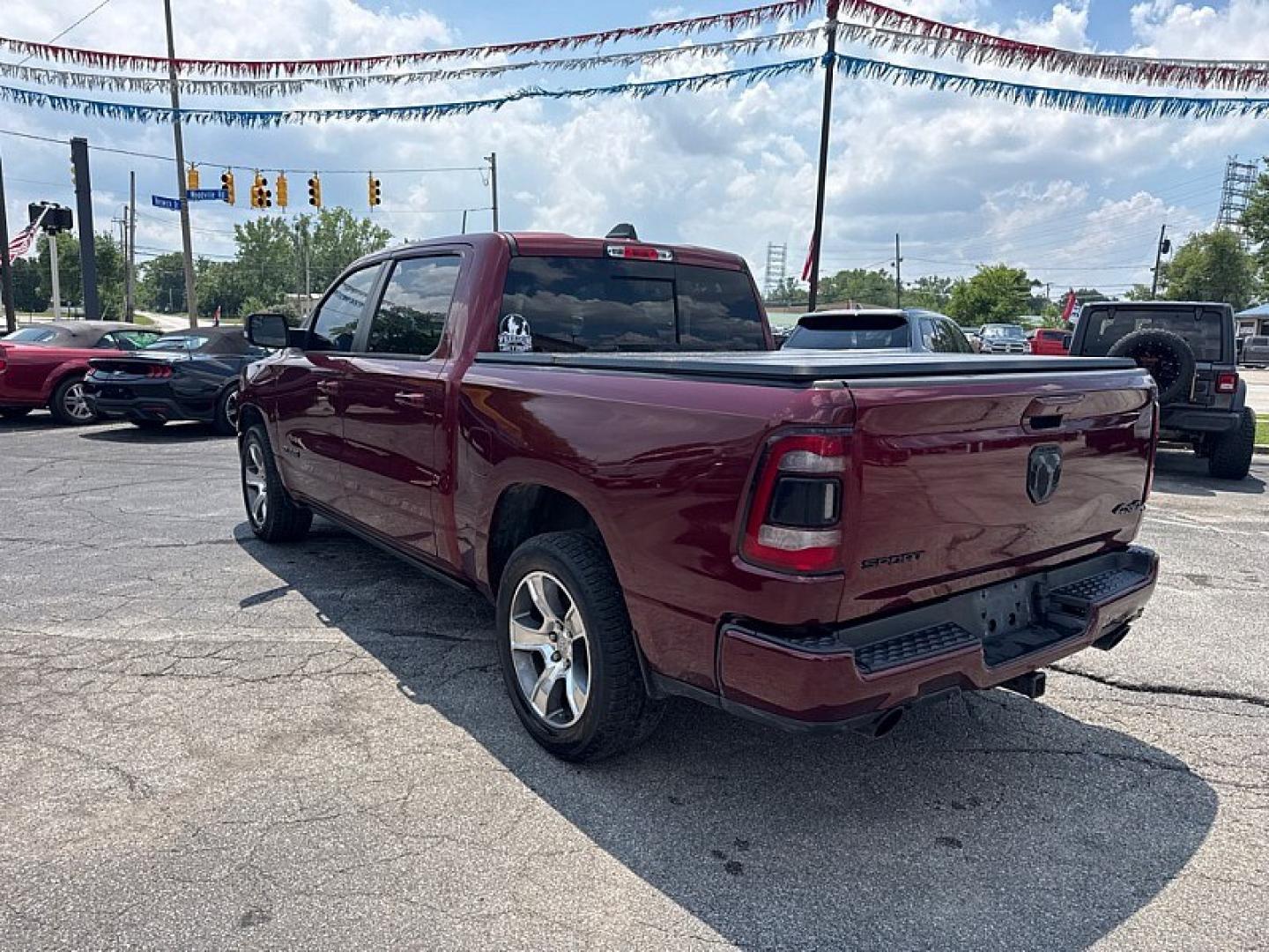 2019 MAROON /BLACK RAM 1500 Rebel Crew Cab SB 4WD (1C6SRFLTXKN) with an 5.7L V8 OHV 16V engine, 8A transmission, located at 3304 Woodville Road, Northwood, OH, 43619, (419) 210-8019, 41.612694, -83.480743 - Your #1 Destination for Auto Loans and mdash;No Matter Your Credit!At our dealership, we believe everyone deserves the opportunity to drive their dream car and mdash;whether you have good credit, bad credit, or no credit at all. With a wide selection of hundreds of cars, trucks, and SUVs, you'll fin- Photo#2