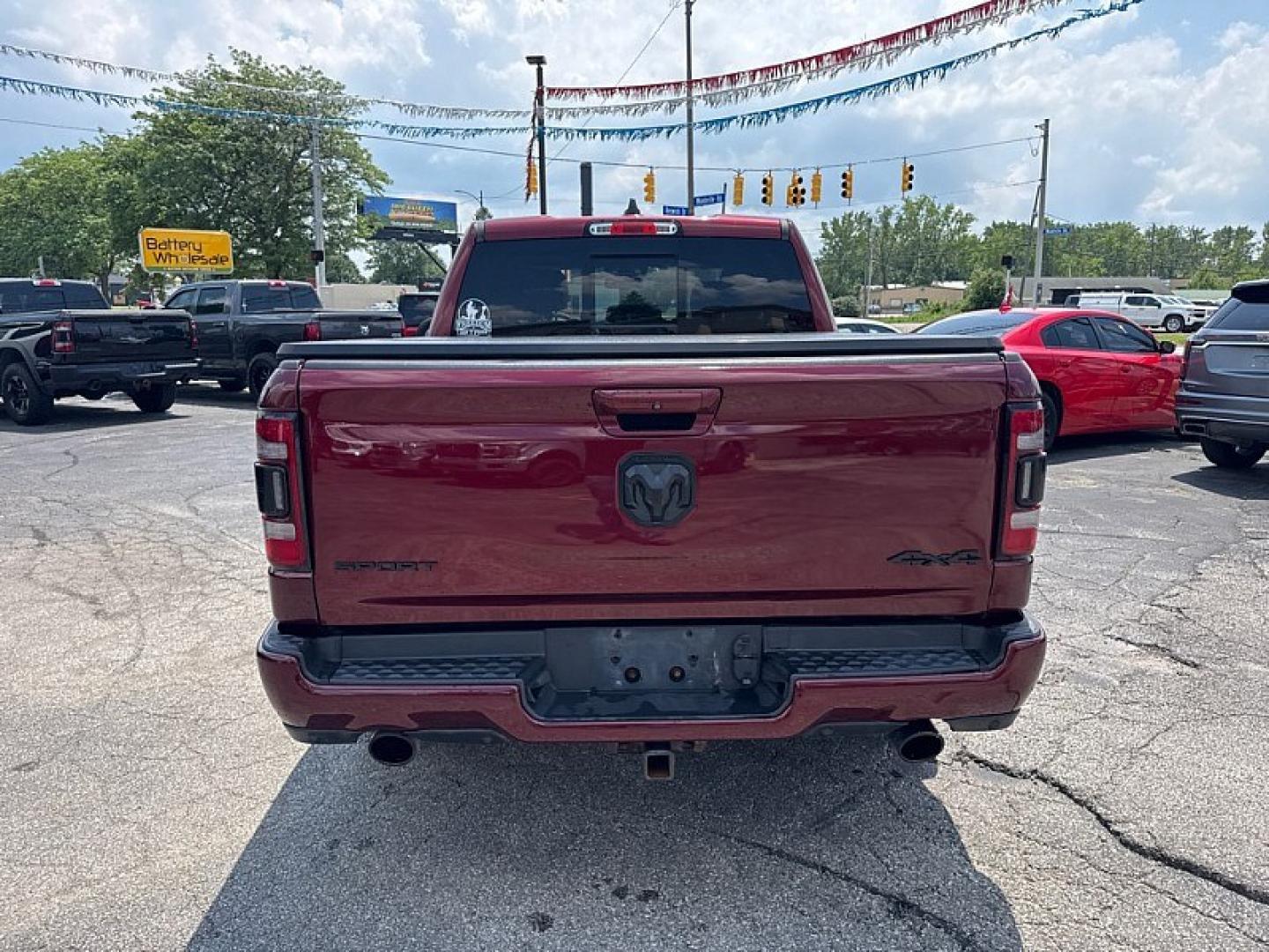 2019 MAROON /BLACK RAM 1500 Rebel Crew Cab SB 4WD (1C6SRFLTXKN) with an 5.7L V8 OHV 16V engine, 8A transmission, located at 3304 Woodville Road, Northwood, OH, 43619, (419) 210-8019, 41.612694, -83.480743 - Your #1 Destination for Auto Loans and mdash;No Matter Your Credit!At our dealership, we believe everyone deserves the opportunity to drive their dream car and mdash;whether you have good credit, bad credit, or no credit at all. With a wide selection of hundreds of cars, trucks, and SUVs, you'll fin- Photo#3