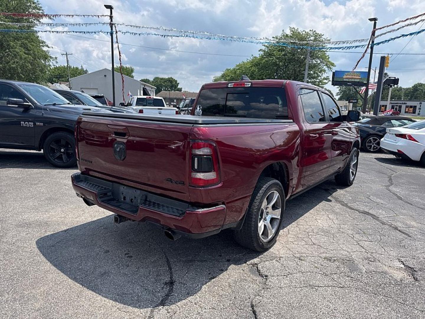 2019 MAROON /BLACK RAM 1500 Rebel Crew Cab SB 4WD (1C6SRFLTXKN) with an 5.7L V8 OHV 16V engine, 8A transmission, located at 3304 Woodville Road, Northwood, OH, 43619, (419) 210-8019, 41.612694, -83.480743 - Your #1 Destination for Auto Loans and mdash;No Matter Your Credit!At our dealership, we believe everyone deserves the opportunity to drive their dream car and mdash;whether you have good credit, bad credit, or no credit at all. With a wide selection of hundreds of cars, trucks, and SUVs, you'll fin- Photo#4