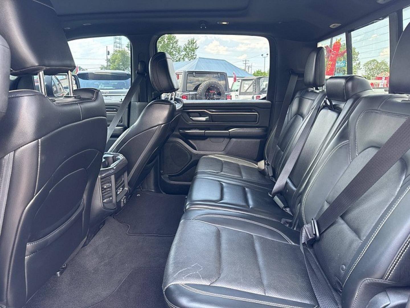2019 MAROON /BLACK RAM 1500 Rebel Crew Cab SB 4WD (1C6SRFLTXKN) with an 5.7L V8 OHV 16V engine, 8A transmission, located at 3304 Woodville Road, Northwood, OH, 43619, (419) 210-8019, 41.612694, -83.480743 - Your #1 Destination for Auto Loans and mdash;No Matter Your Credit!At our dealership, we believe everyone deserves the opportunity to drive their dream car and mdash;whether you have good credit, bad credit, or no credit at all. With a wide selection of hundreds of cars, trucks, and SUVs, you'll fin- Photo#11