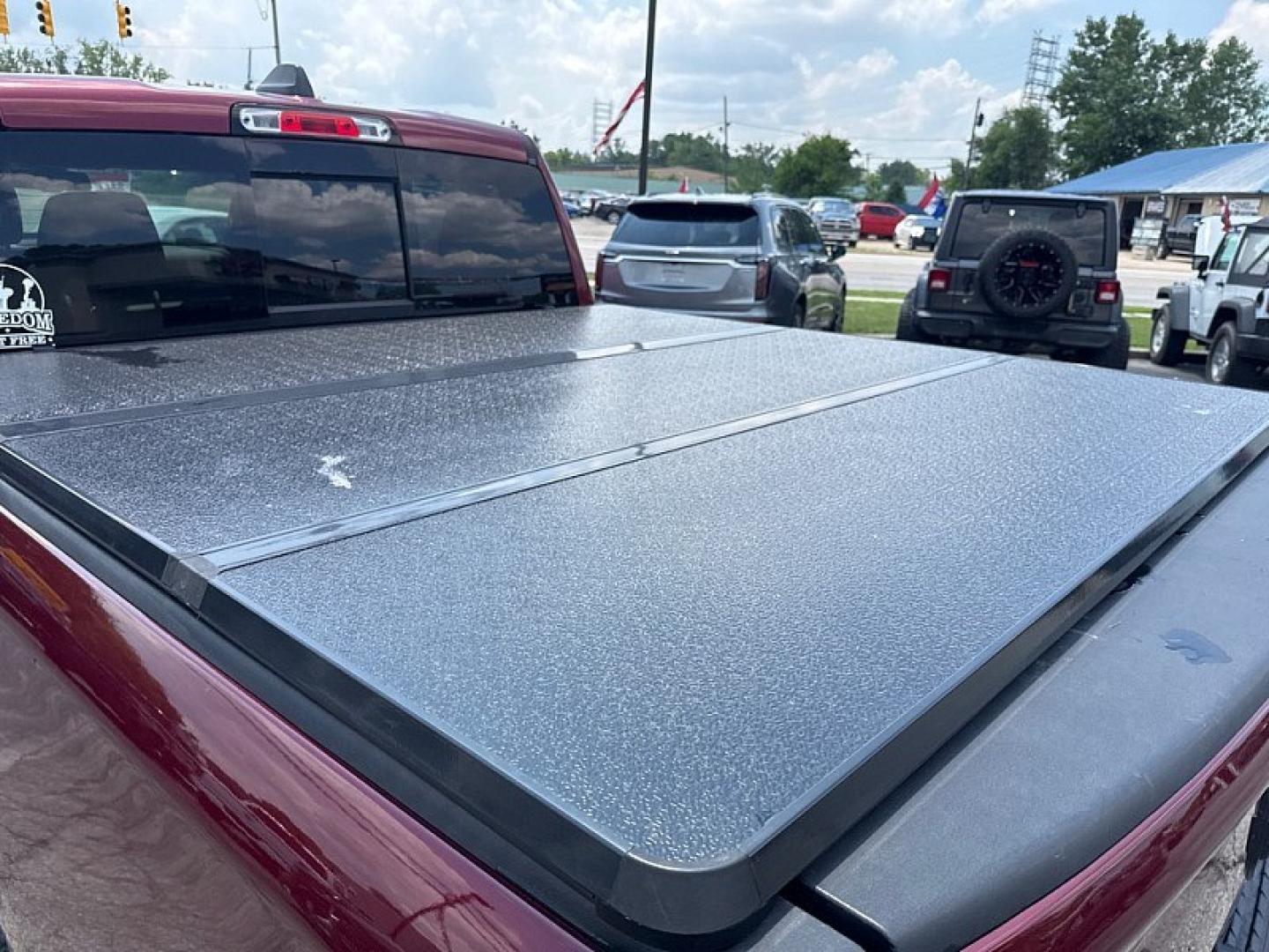2019 MAROON /BLACK RAM 1500 Rebel Crew Cab SB 4WD (1C6SRFLTXKN) with an 5.7L V8 OHV 16V engine, 8A transmission, located at 3304 Woodville Road, Northwood, OH, 43619, (419) 210-8019, 41.612694, -83.480743 - Your #1 Destination for Auto Loans and mdash;No Matter Your Credit!At our dealership, we believe everyone deserves the opportunity to drive their dream car and mdash;whether you have good credit, bad credit, or no credit at all. With a wide selection of hundreds of cars, trucks, and SUVs, you'll fin- Photo#12