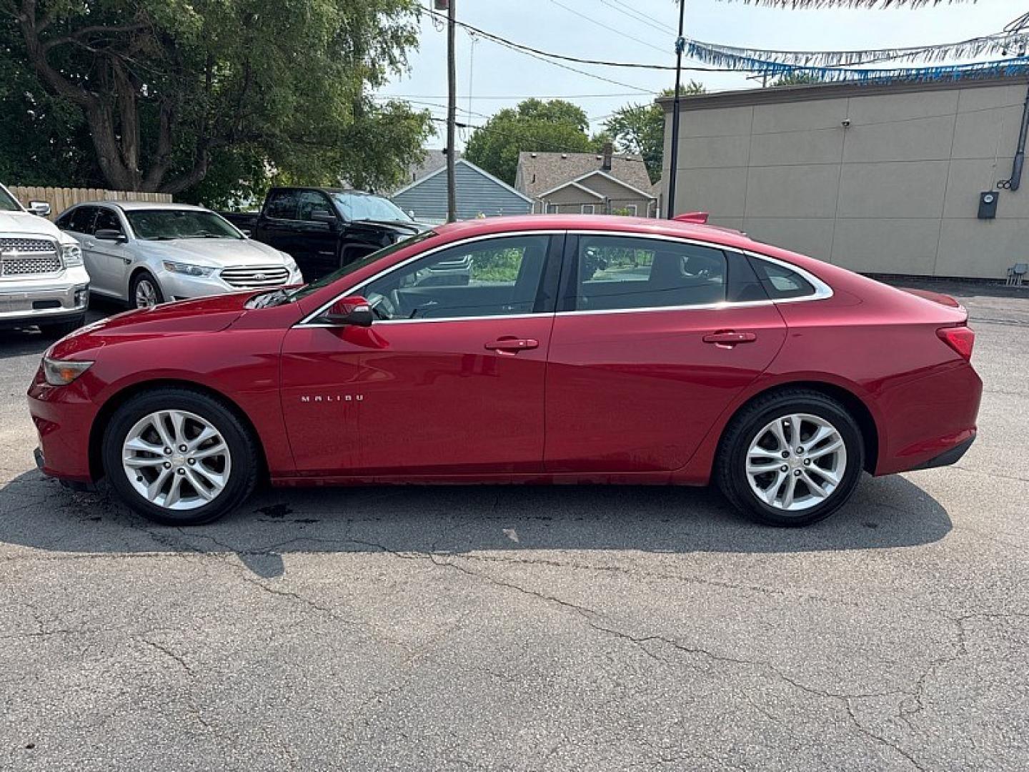 2016 RED /BLACK Chevrolet Malibu 1LT (1G1ZE5ST0GF) with an 1.5L L4 DOHC 16V engine, 6A transmission, located at 3304 Woodville Road, Northwood, OH, 43619, (419) 210-8019, 41.612694, -83.480743 - Your #1 Destination for Auto Loans and mdash;No Matter Your Credit!At our dealership, we believe everyone deserves the opportunity to drive their dream car and mdash;whether you have good credit, bad credit, or no credit at all. With a wide selection of hundreds of cars, trucks, and SUVs, you'll fin- Photo#1