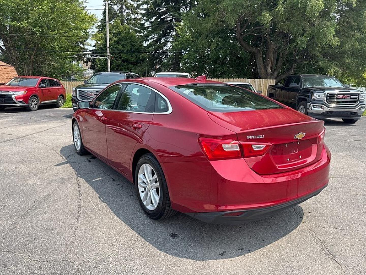 2016 RED /BLACK Chevrolet Malibu 1LT (1G1ZE5ST0GF) with an 1.5L L4 DOHC 16V engine, 6A transmission, located at 3304 Woodville Road, Northwood, OH, 43619, (419) 210-8019, 41.612694, -83.480743 - Your #1 Destination for Auto Loans and mdash;No Matter Your Credit!At our dealership, we believe everyone deserves the opportunity to drive their dream car and mdash;whether you have good credit, bad credit, or no credit at all. With a wide selection of hundreds of cars, trucks, and SUVs, you'll fin- Photo#2