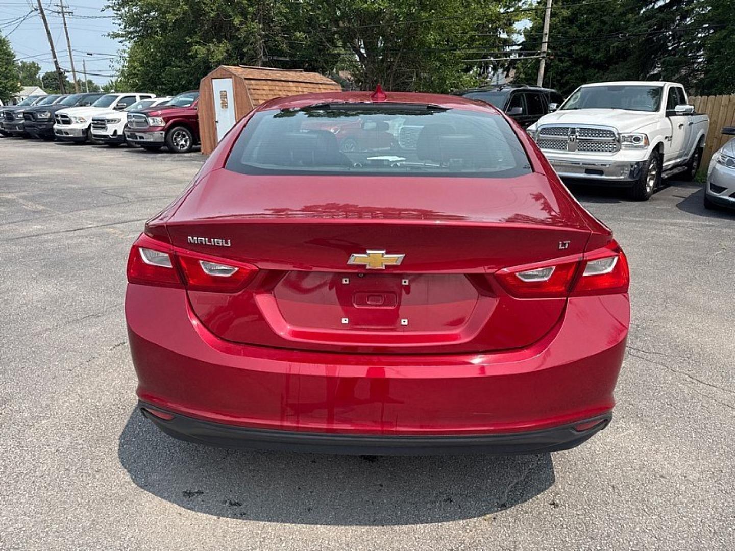 2016 RED /BLACK Chevrolet Malibu 1LT (1G1ZE5ST0GF) with an 1.5L L4 DOHC 16V engine, 6A transmission, located at 3304 Woodville Road, Northwood, OH, 43619, (419) 210-8019, 41.612694, -83.480743 - Your #1 Destination for Auto Loans and mdash;No Matter Your Credit!At our dealership, we believe everyone deserves the opportunity to drive their dream car and mdash;whether you have good credit, bad credit, or no credit at all. With a wide selection of hundreds of cars, trucks, and SUVs, you'll fin- Photo#3