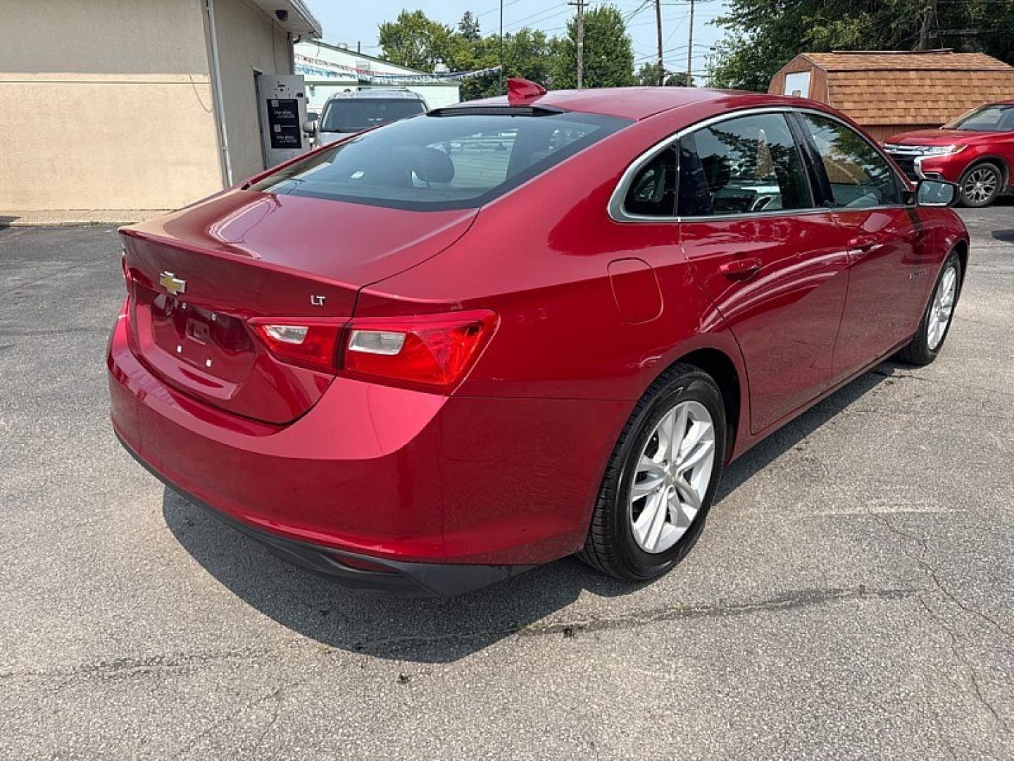 2016 RED /BLACK Chevrolet Malibu 1LT (1G1ZE5ST0GF) with an 1.5L L4 DOHC 16V engine, 6A transmission, located at 3304 Woodville Road, Northwood, OH, 43619, (419) 210-8019, 41.612694, -83.480743 - Your #1 Destination for Auto Loans and mdash;No Matter Your Credit!At our dealership, we believe everyone deserves the opportunity to drive their dream car and mdash;whether you have good credit, bad credit, or no credit at all. With a wide selection of hundreds of cars, trucks, and SUVs, you'll fin- Photo#4