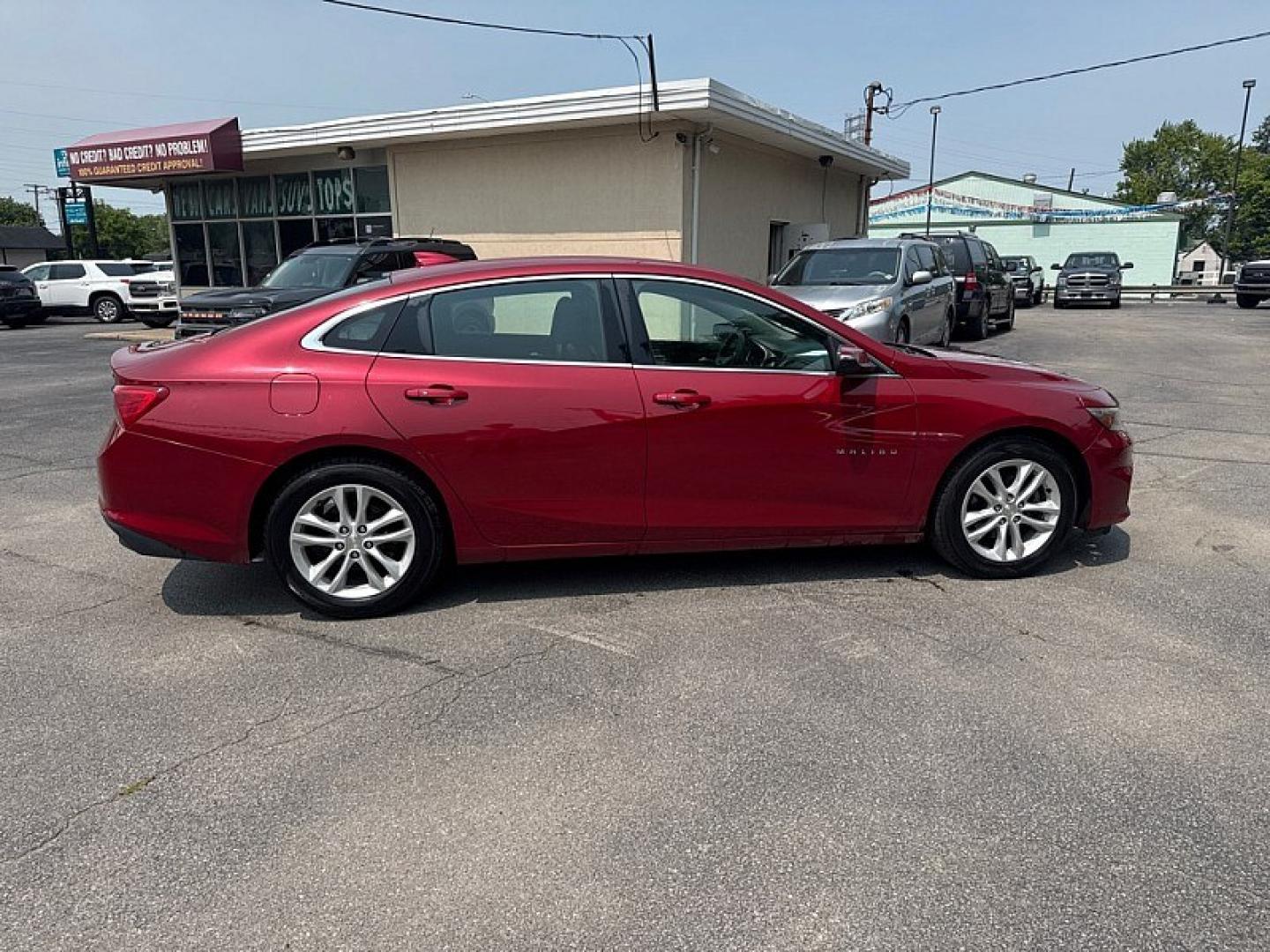 2016 RED /BLACK Chevrolet Malibu 1LT (1G1ZE5ST0GF) with an 1.5L L4 DOHC 16V engine, 6A transmission, located at 3304 Woodville Road, Northwood, OH, 43619, (419) 210-8019, 41.612694, -83.480743 - Your #1 Destination for Auto Loans and mdash;No Matter Your Credit!At our dealership, we believe everyone deserves the opportunity to drive their dream car and mdash;whether you have good credit, bad credit, or no credit at all. With a wide selection of hundreds of cars, trucks, and SUVs, you'll fin- Photo#5