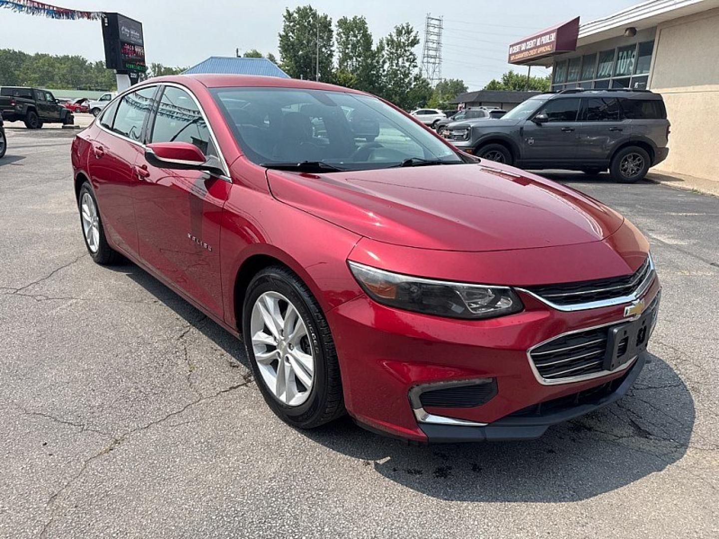 2016 RED /BLACK Chevrolet Malibu 1LT (1G1ZE5ST0GF) with an 1.5L L4 DOHC 16V engine, 6A transmission, located at 3304 Woodville Road, Northwood, OH, 43619, (419) 210-8019, 41.612694, -83.480743 - Your #1 Destination for Auto Loans and mdash;No Matter Your Credit!At our dealership, we believe everyone deserves the opportunity to drive their dream car and mdash;whether you have good credit, bad credit, or no credit at all. With a wide selection of hundreds of cars, trucks, and SUVs, you'll fin- Photo#6