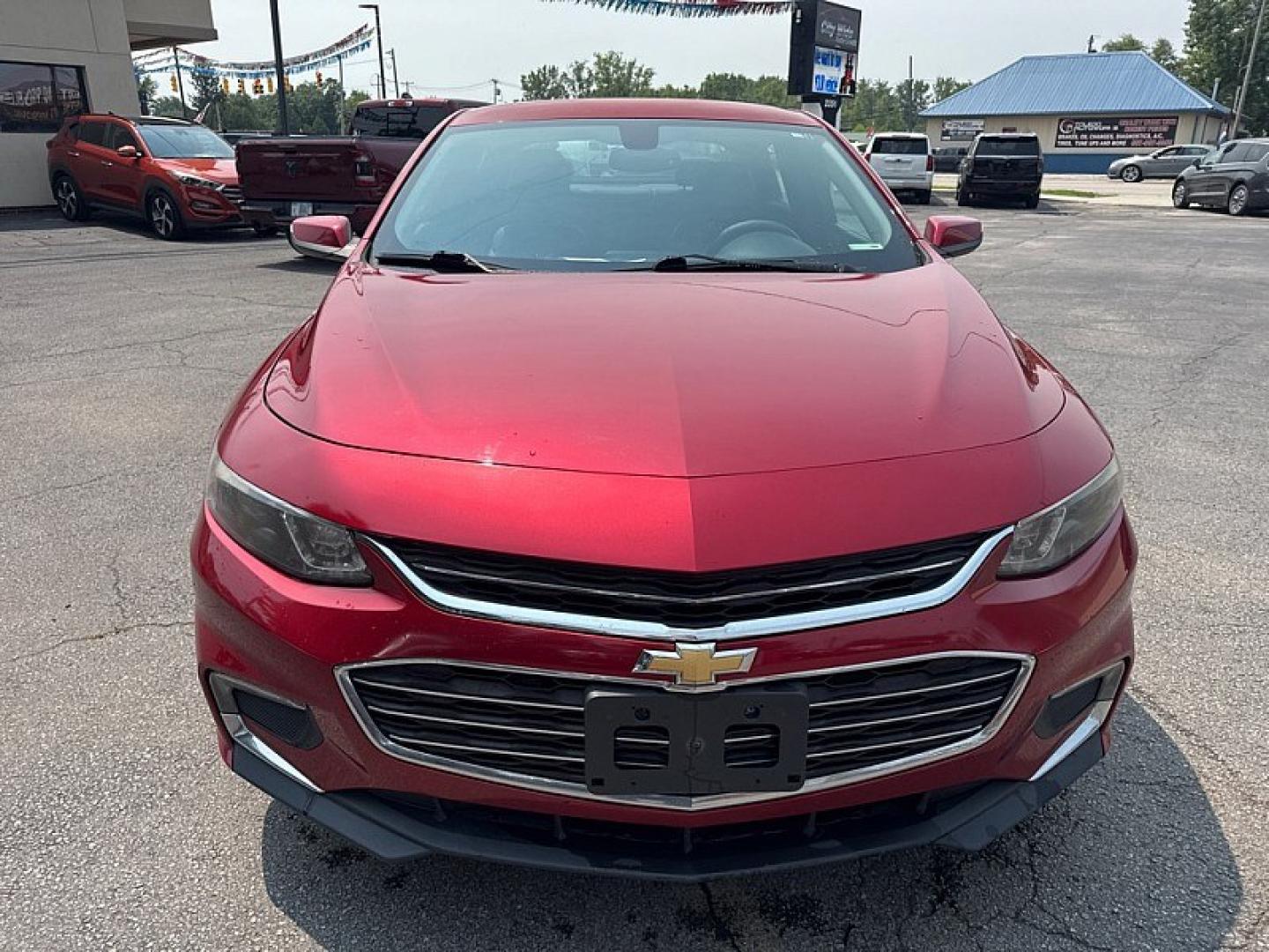 2016 RED /BLACK Chevrolet Malibu 1LT (1G1ZE5ST0GF) with an 1.5L L4 DOHC 16V engine, 6A transmission, located at 3304 Woodville Road, Northwood, OH, 43619, (419) 210-8019, 41.612694, -83.480743 - Your #1 Destination for Auto Loans and mdash;No Matter Your Credit!At our dealership, we believe everyone deserves the opportunity to drive their dream car and mdash;whether you have good credit, bad credit, or no credit at all. With a wide selection of hundreds of cars, trucks, and SUVs, you'll fin- Photo#7