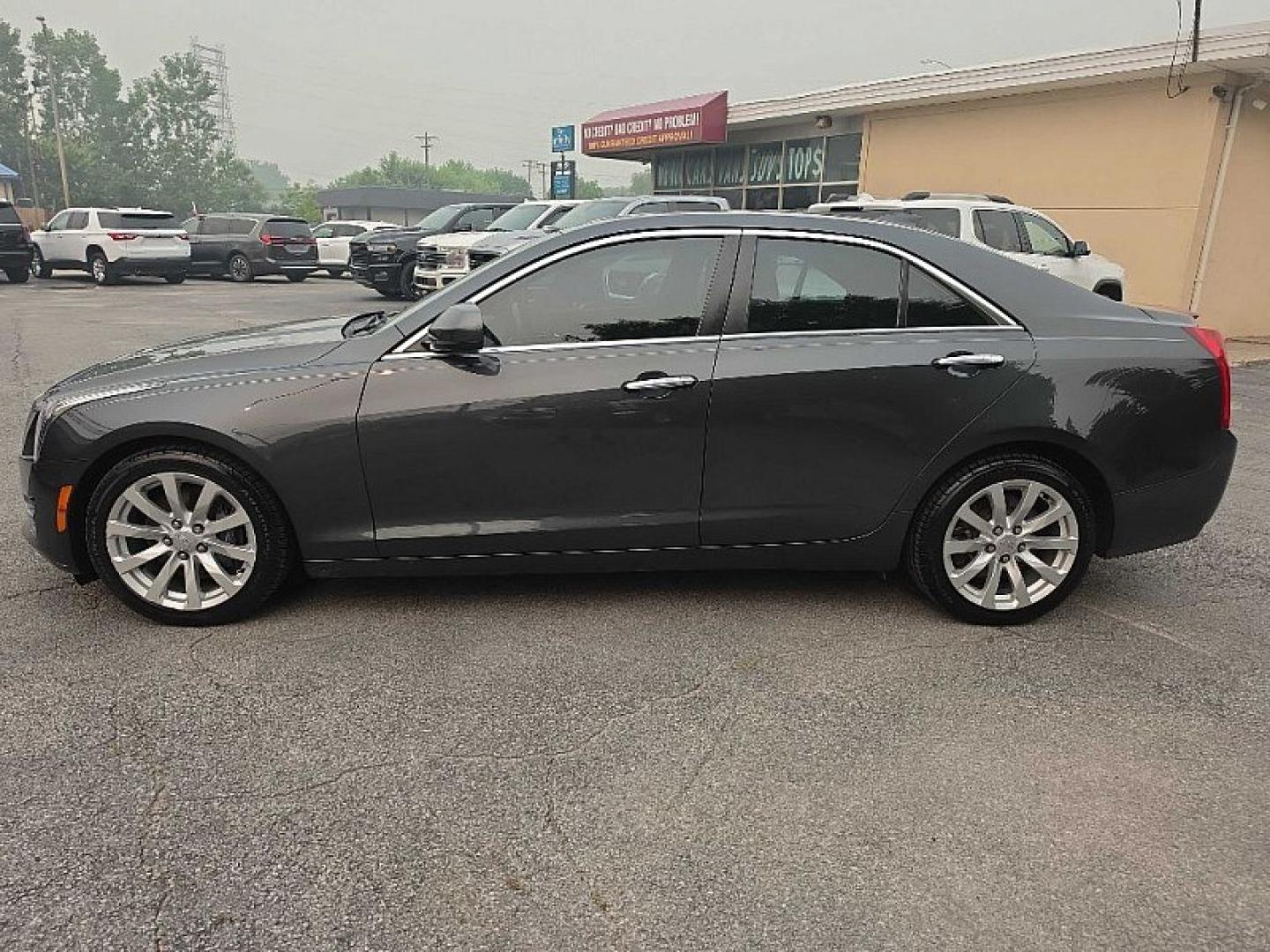 2018 GRAY /BLACK Cadillac ATS 2.0L AWD (1G6AE5RX1J0) with an 2.0L L4 DOHC 16V TURBO engine, Automatic 8-Spd transmission, located at 3304 Woodville Road, Northwood, OH, 43619, (419) 210-8019, 41.612694, -83.480743 - Your #1 Destination for Auto Loans and mdash;No Matter Your Credit!At our dealership, we believe everyone deserves the opportunity to drive their dream car and mdash;whether you have good credit, bad credit, or no credit at all. With a wide selection of hundreds of cars, trucks, and SUVs, you'll fin- Photo#1