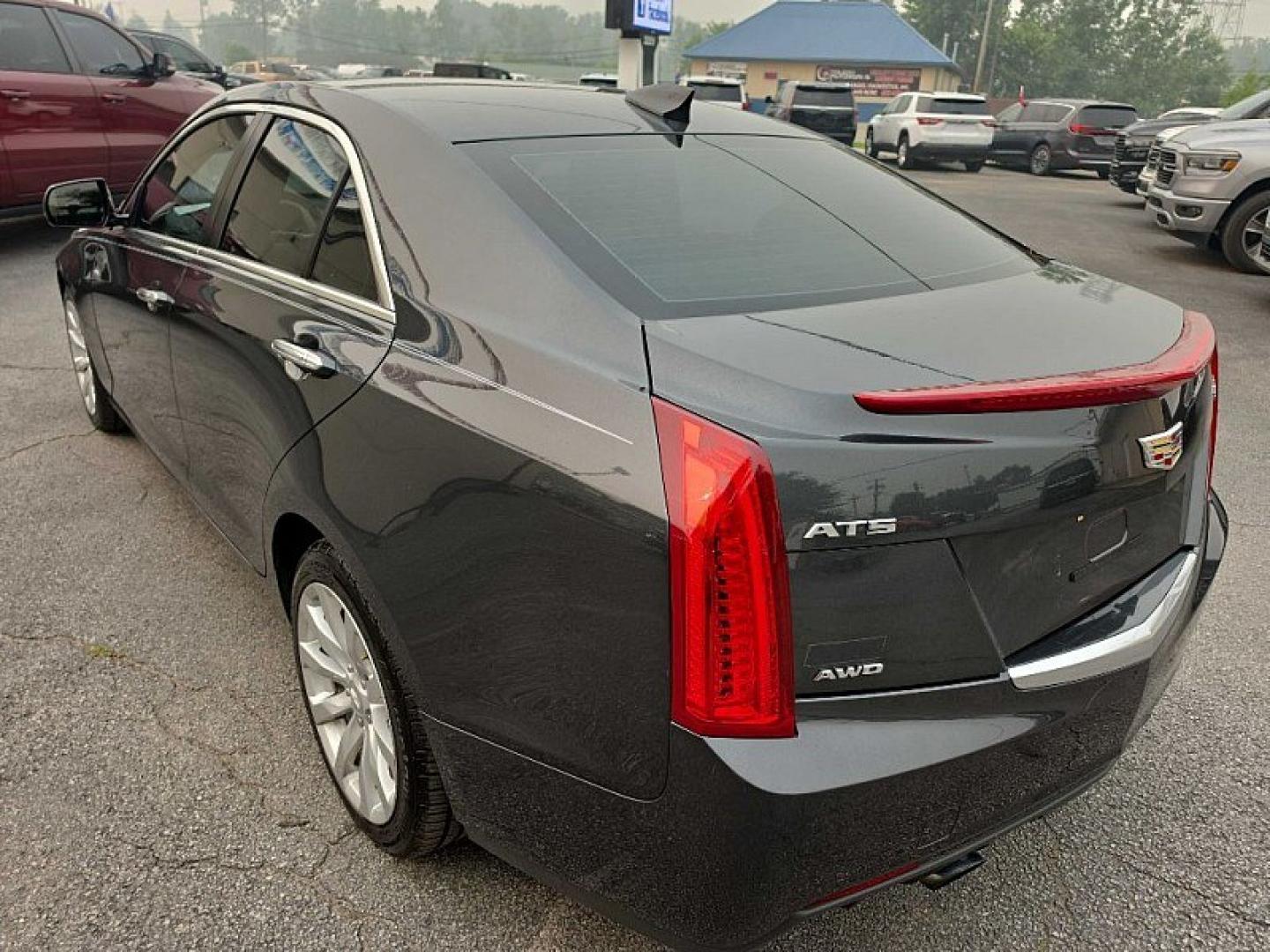 2018 GRAY /BLACK Cadillac ATS 2.0L AWD (1G6AE5RX1J0) with an 2.0L L4 DOHC 16V TURBO engine, Automatic 8-Spd transmission, located at 3304 Woodville Road, Northwood, OH, 43619, (419) 210-8019, 41.612694, -83.480743 - Your #1 Destination for Auto Loans and mdash;No Matter Your Credit!At our dealership, we believe everyone deserves the opportunity to drive their dream car and mdash;whether you have good credit, bad credit, or no credit at all. With a wide selection of hundreds of cars, trucks, and SUVs, you'll fin- Photo#2