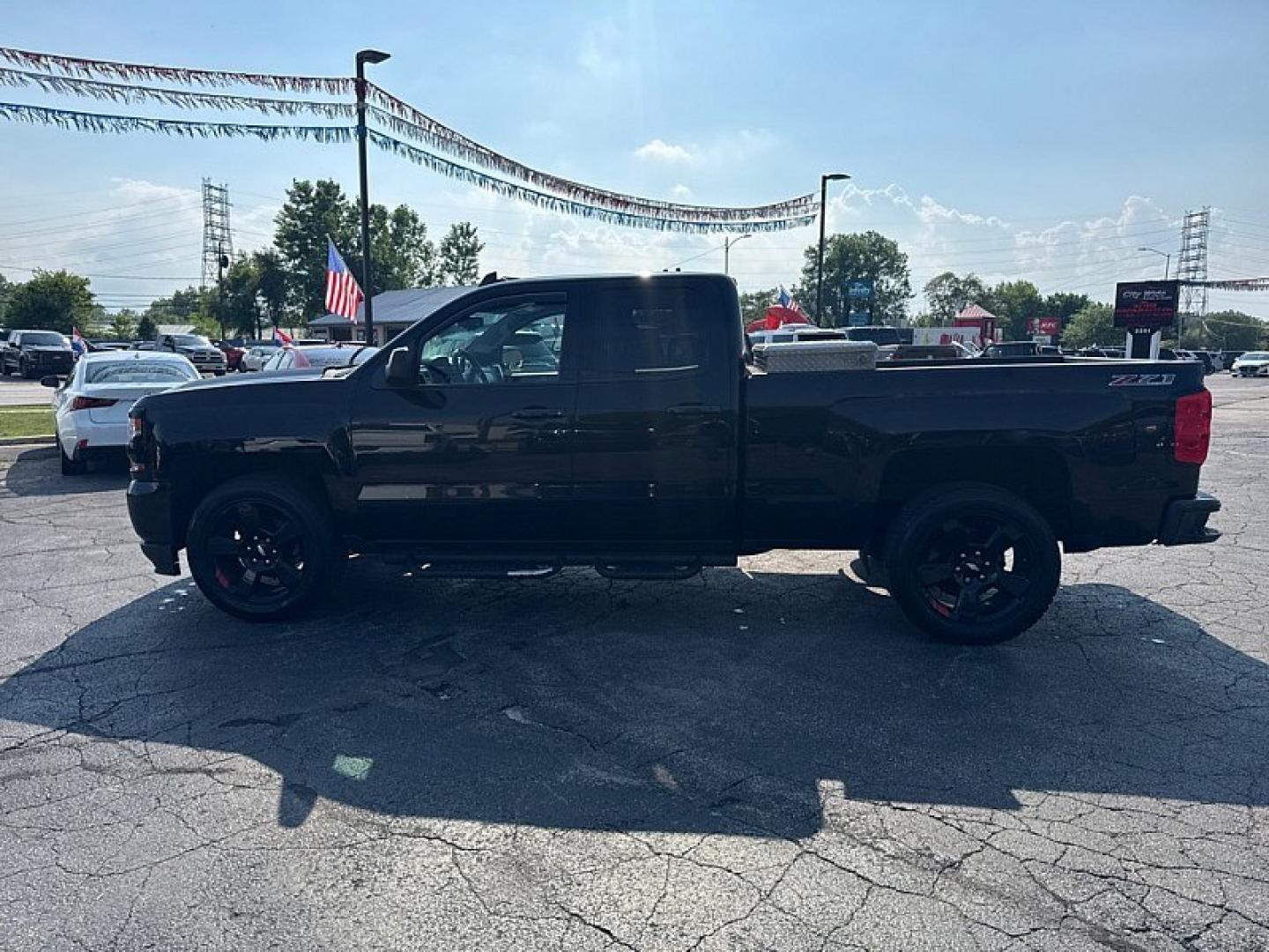 2017 BLACK /BLACK Chevrolet Silverado 1500 LT Double Cab 4WD (1GCVKREC4HZ) with an 5.3L V8 OHV 16V engine, 6A transmission, located at 3304 Woodville Road, Northwood, OH, 43619, (419) 210-8019, 41.612694, -83.480743 - Your #1 Destination for Auto Loans and mdash;No Matter Your Credit!At our dealership, we believe everyone deserves the opportunity to drive their dream car and mdash;whether you have good credit, bad credit, or no credit at all. With a wide selection of hundreds of cars, trucks, and SUVs, you'll fin- Photo#1