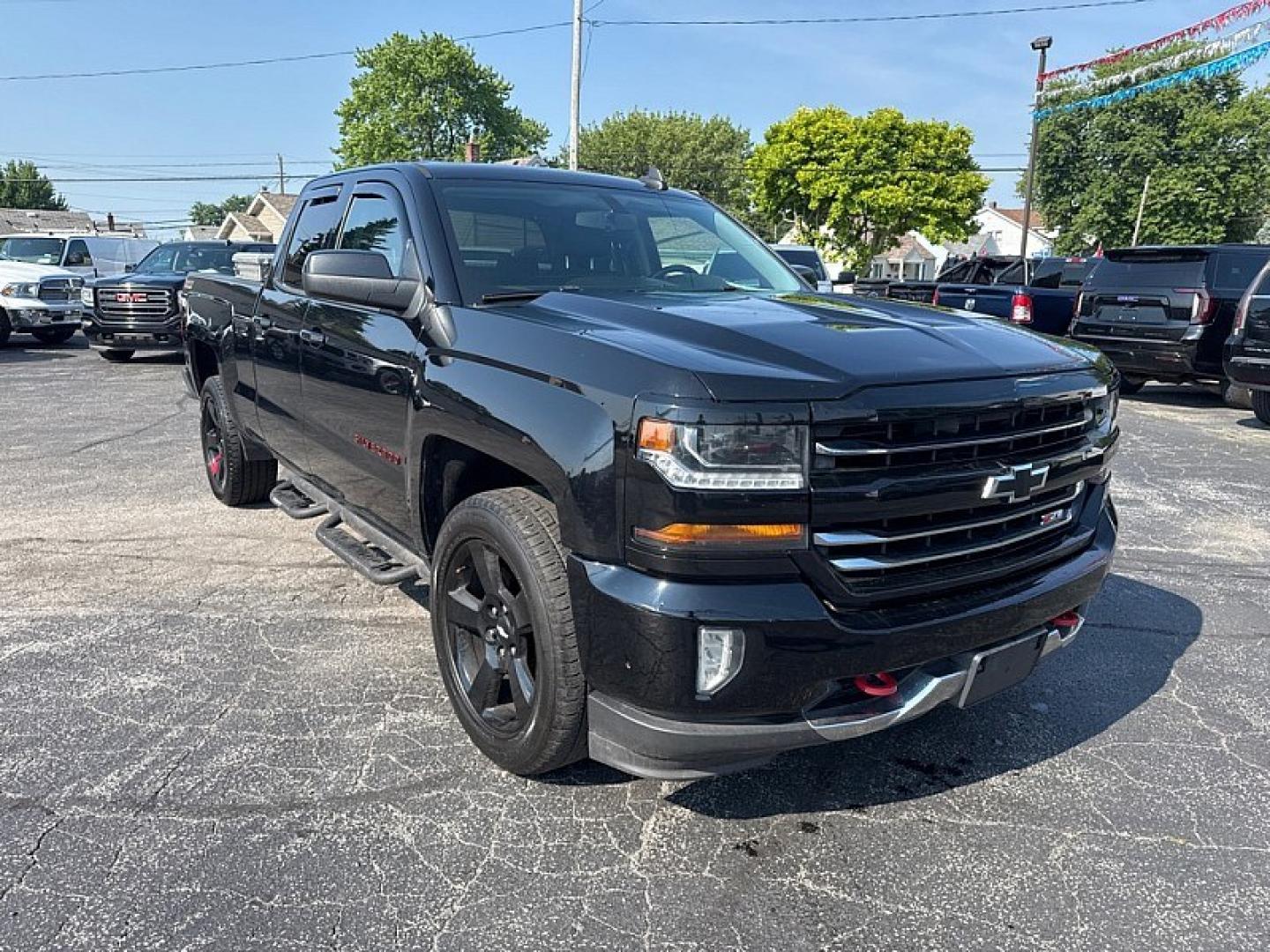 2017 BLACK /BLACK Chevrolet Silverado 1500 LT Double Cab 4WD (1GCVKREC4HZ) with an 5.3L V8 OHV 16V engine, 6A transmission, located at 3304 Woodville Road, Northwood, OH, 43619, (419) 210-8019, 41.612694, -83.480743 - Your #1 Destination for Auto Loans and mdash;No Matter Your Credit!At our dealership, we believe everyone deserves the opportunity to drive their dream car and mdash;whether you have good credit, bad credit, or no credit at all. With a wide selection of hundreds of cars, trucks, and SUVs, you'll fin- Photo#6