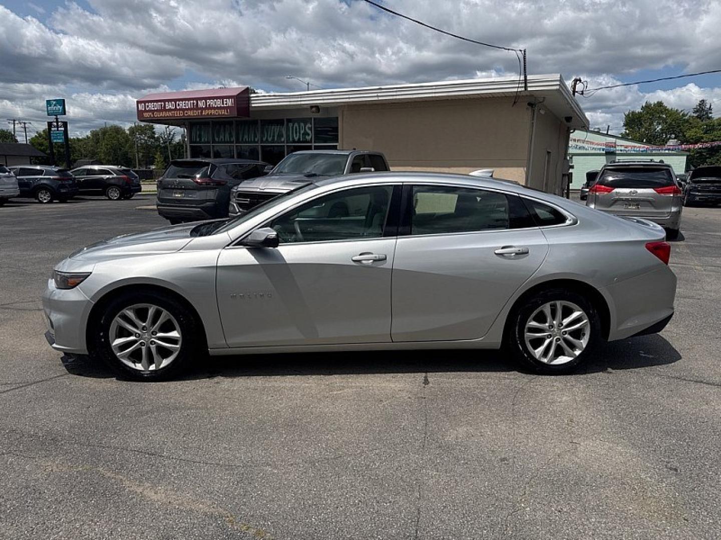 2017 SILVER /BEIGE Chevrolet Malibu 1LT (1G1ZE5ST2HF) with an 1.5L L4 DOHC 16V engine, 6A transmission, located at 3304 Woodville Road, Northwood, OH, 43619, (419) 210-8019, 41.612694, -83.480743 - Your #1 Destination for Auto Loans and mdash;No Matter Your Credit!At our dealership, we believe everyone deserves the opportunity to drive their dream car and mdash;whether you have good credit, bad credit, or no credit at all. With a wide selection of hundreds of cars, trucks, and SUVs, you'll fin- Photo#1