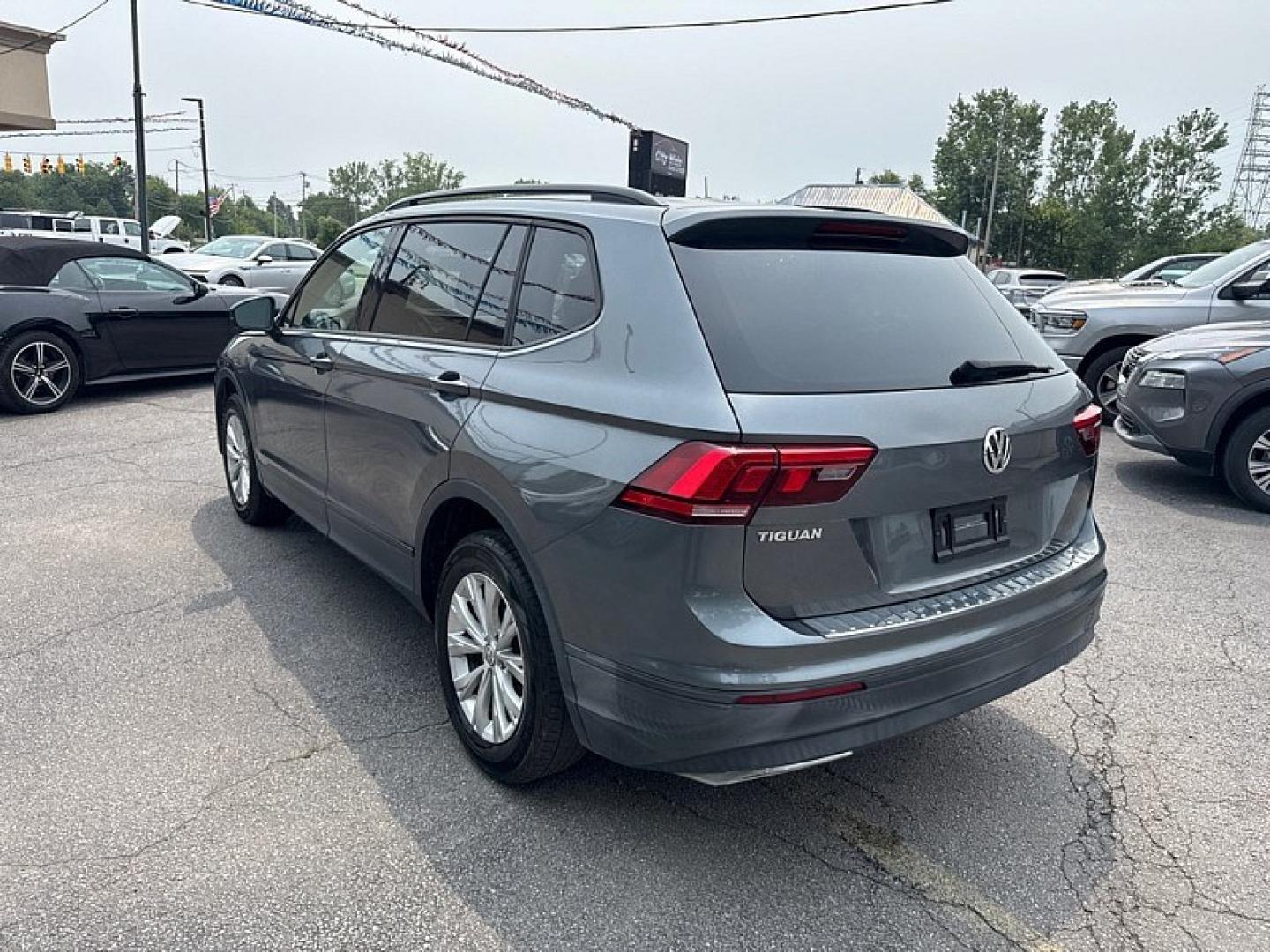 2019 GRAY /BLACK Volkswagen Tiguan S (3VV1B7AX7KM) with an 2.0L L4 DOHC 16V TURBO engine, 8A transmission, located at 3304 Woodville Road, Northwood, OH, 43619, (419) 210-8019, 41.612694, -83.480743- Photo#2