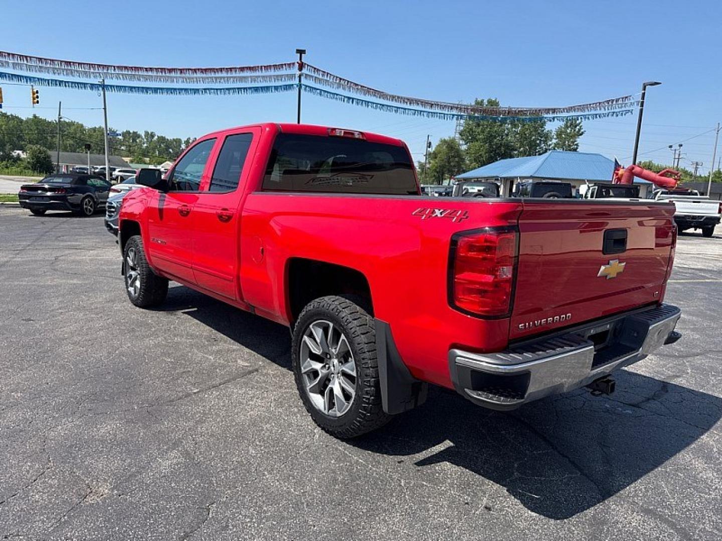 2018 RED /BLACK Chevrolet Silverado 1500 LT Double Cab 4WD (1GCVKREC8JZ) with an 5.3L V8 OHV 16V engine, 6A transmission, located at 3304 Woodville Road, Northwood, OH, 43619, (419) 210-8019, 41.612694, -83.480743 - Your #1 Destination for Auto Loans and mdash;No Matter Your Credit!At our dealership, we believe everyone deserves the opportunity to drive their dream car and mdash;whether you have good credit, bad credit, or no credit at all. With a wide selection of hundreds of cars, trucks, and SUVs, you'll fin- Photo#2
