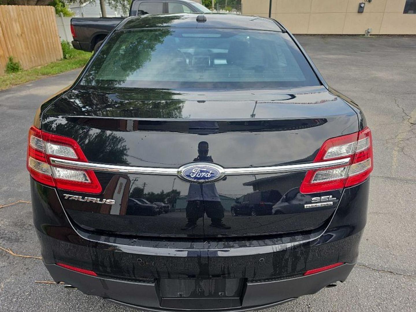 2018 BLACK /BLACK Ford Taurus SEL FWD (1FAHP2E83JG) with an 3.5L V6 DOHC 24V engine, 6A transmission, located at 3304 Woodville Road, Northwood, OH, 43619, (419) 210-8019, 41.612694, -83.480743 - Your #1 Destination for Auto Loans and mdash;No Matter Your Credit!At our dealership, we believe everyone deserves the opportunity to drive their dream car and mdash;whether you have good credit, bad credit, or no credit at all. With a wide selection of hundreds of cars, trucks, and SUVs, you'll fin- Photo#3