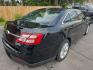 2018 BLACK /BLACK Ford Taurus SEL FWD (1FAHP2E83JG) with an 3.5L V6 DOHC 24V engine, 6A transmission, located at 3304 Woodville Road, Northwood, OH, 43619, (419) 210-8019, 41.612694, -83.480743 - Your #1 Destination for Auto Loans and mdash;No Matter Your Credit!At our dealership, we believe everyone deserves the opportunity to drive their dream car and mdash;whether you have good credit, bad credit, or no credit at all. With a wide selection of hundreds of cars, trucks, and SUVs, you'll fin- Photo#4