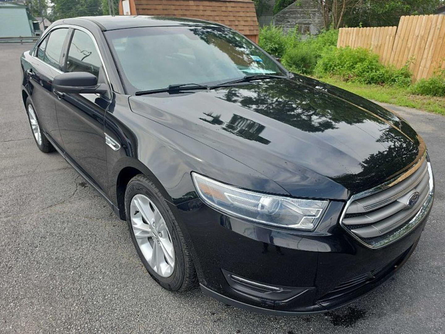 2018 BLACK /BLACK Ford Taurus SEL FWD (1FAHP2E83JG) with an 3.5L V6 DOHC 24V engine, 6A transmission, located at 3304 Woodville Road, Northwood, OH, 43619, (419) 210-8019, 41.612694, -83.480743 - Your #1 Destination for Auto Loans and mdash;No Matter Your Credit!At our dealership, we believe everyone deserves the opportunity to drive their dream car and mdash;whether you have good credit, bad credit, or no credit at all. With a wide selection of hundreds of cars, trucks, and SUVs, you'll fin- Photo#6