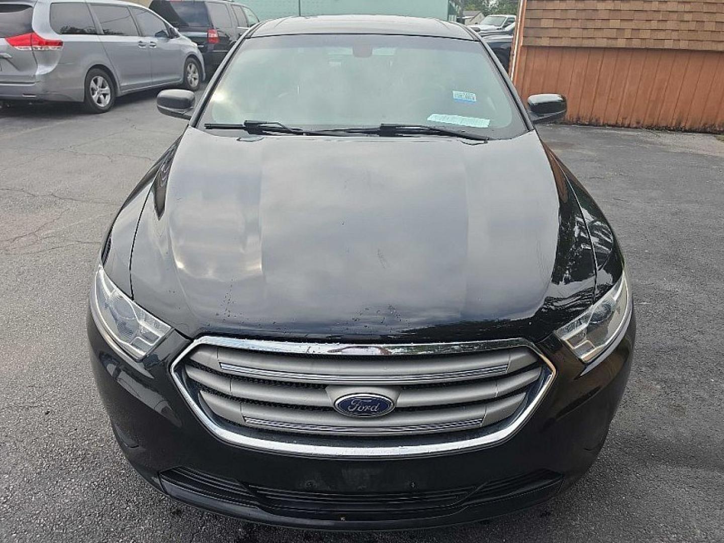 2018 BLACK /BLACK Ford Taurus SEL FWD (1FAHP2E83JG) with an 3.5L V6 DOHC 24V engine, 6A transmission, located at 3304 Woodville Road, Northwood, OH, 43619, (419) 210-8019, 41.612694, -83.480743 - Your #1 Destination for Auto Loans and mdash;No Matter Your Credit!At our dealership, we believe everyone deserves the opportunity to drive their dream car and mdash;whether you have good credit, bad credit, or no credit at all. With a wide selection of hundreds of cars, trucks, and SUVs, you'll fin- Photo#7