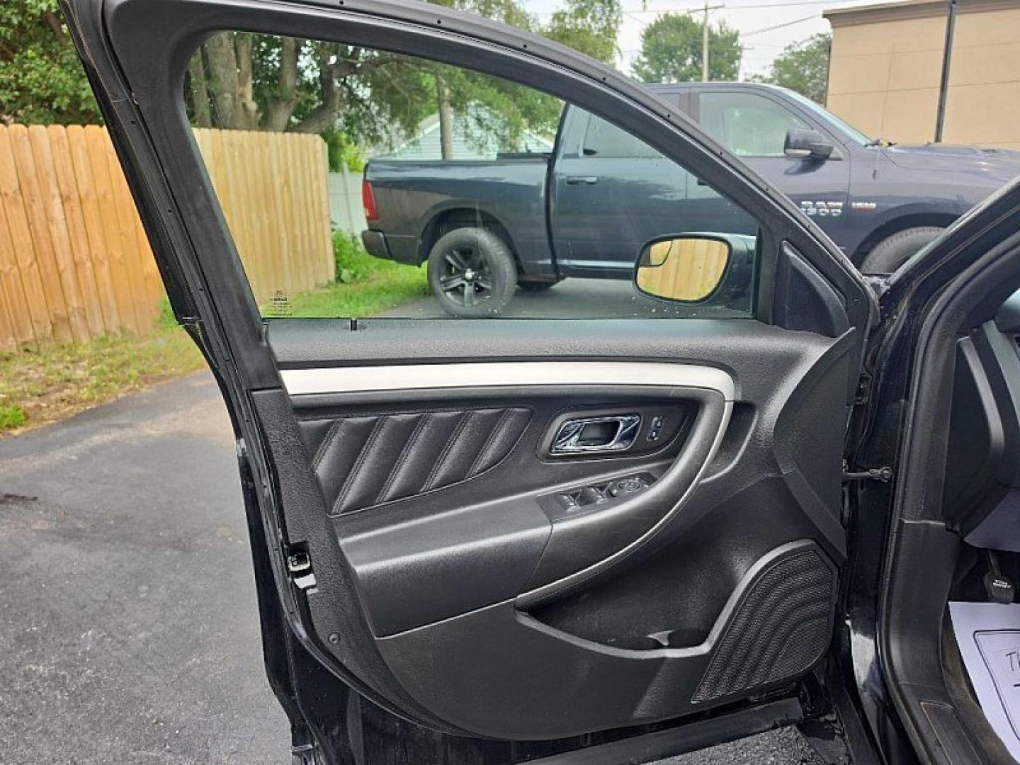 2018 BLACK /BLACK Ford Taurus SEL FWD (1FAHP2E83JG) with an 3.5L V6 DOHC 24V engine, 6A transmission, located at 3304 Woodville Road, Northwood, OH, 43619, (419) 210-8019, 41.612694, -83.480743 - Your #1 Destination for Auto Loans and mdash;No Matter Your Credit!At our dealership, we believe everyone deserves the opportunity to drive their dream car and mdash;whether you have good credit, bad credit, or no credit at all. With a wide selection of hundreds of cars, trucks, and SUVs, you'll fin- Photo#8