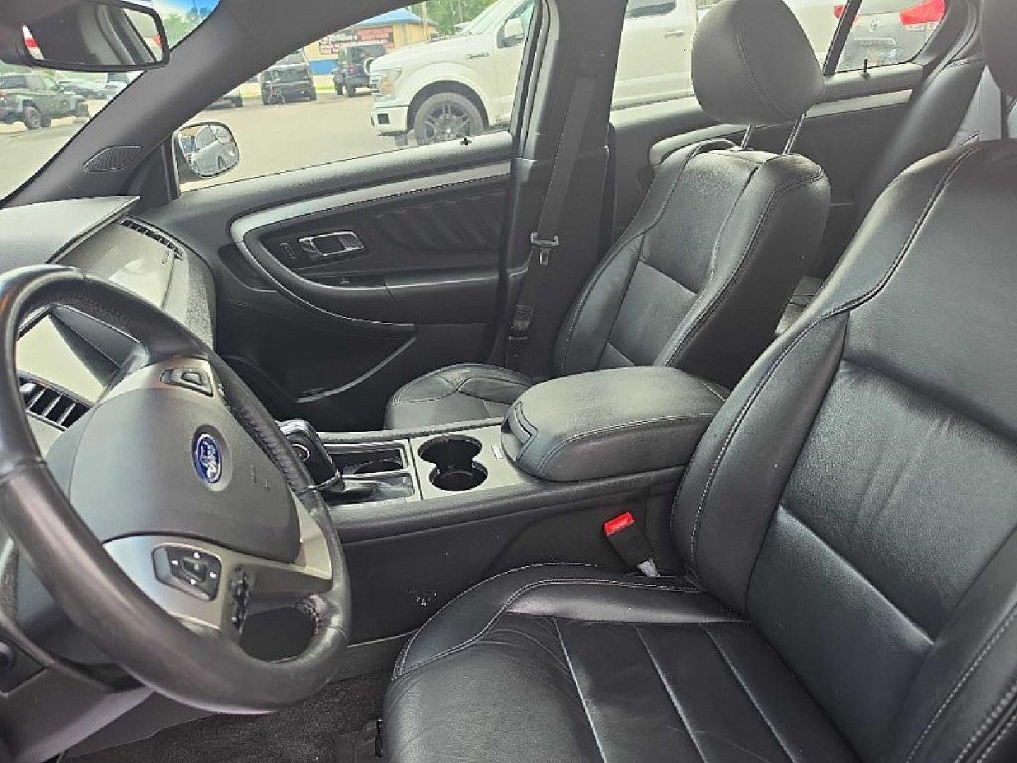 2018 BLACK /BLACK Ford Taurus SEL FWD (1FAHP2E83JG) with an 3.5L V6 DOHC 24V engine, 6A transmission, located at 3304 Woodville Road, Northwood, OH, 43619, (419) 210-8019, 41.612694, -83.480743 - Your #1 Destination for Auto Loans and mdash;No Matter Your Credit!At our dealership, we believe everyone deserves the opportunity to drive their dream car and mdash;whether you have good credit, bad credit, or no credit at all. With a wide selection of hundreds of cars, trucks, and SUVs, you'll fin- Photo#9