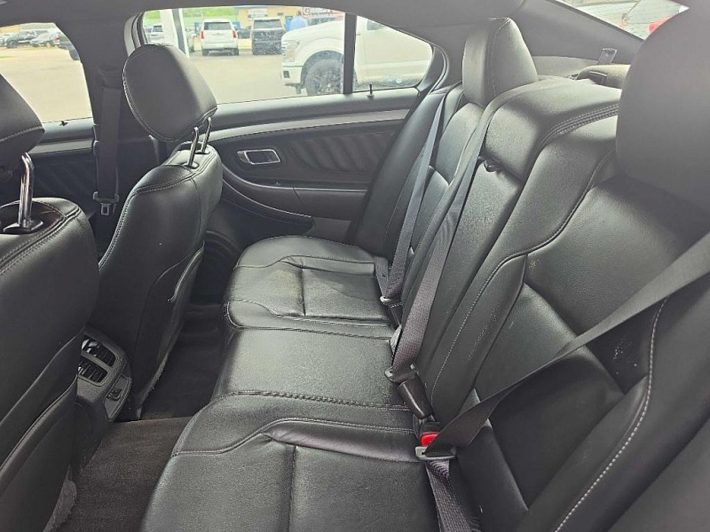 2018 BLACK /BLACK Ford Taurus SEL FWD (1FAHP2E83JG) with an 3.5L V6 DOHC 24V engine, 6A transmission, located at 3304 Woodville Road, Northwood, OH, 43619, (419) 210-8019, 41.612694, -83.480743 - Your #1 Destination for Auto Loans and mdash;No Matter Your Credit!At our dealership, we believe everyone deserves the opportunity to drive their dream car and mdash;whether you have good credit, bad credit, or no credit at all. With a wide selection of hundreds of cars, trucks, and SUVs, you'll fin- Photo#11