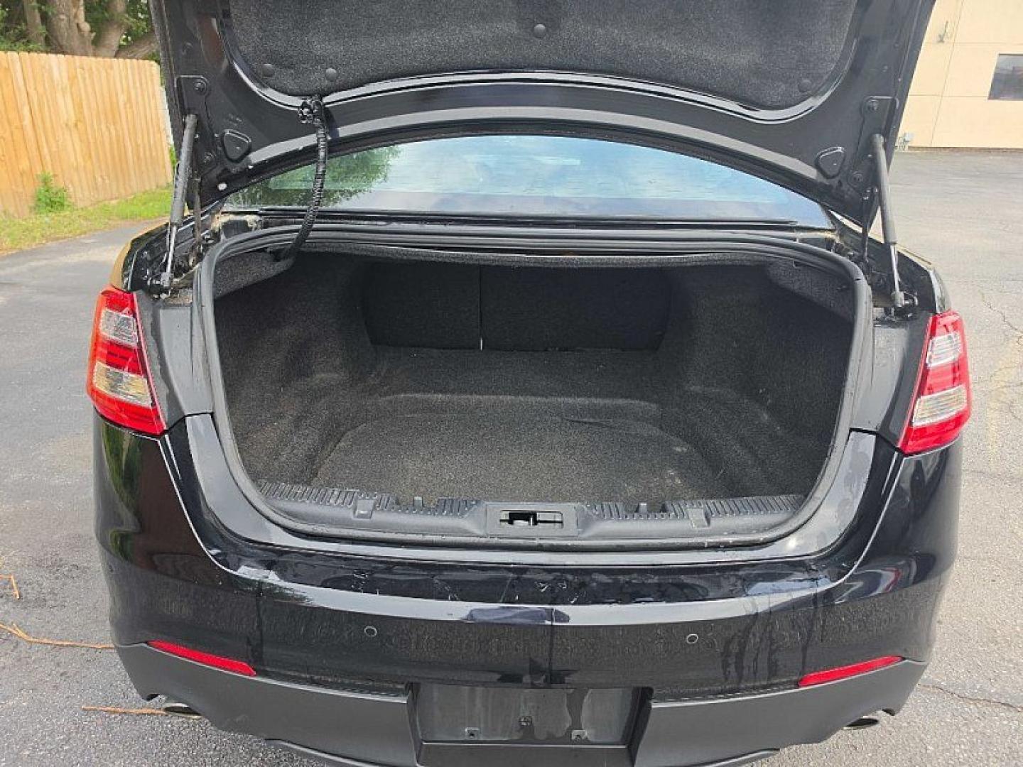 2018 BLACK /BLACK Ford Taurus SEL FWD (1FAHP2E83JG) with an 3.5L V6 DOHC 24V engine, 6A transmission, located at 3304 Woodville Road, Northwood, OH, 43619, (419) 210-8019, 41.612694, -83.480743 - Your #1 Destination for Auto Loans and mdash;No Matter Your Credit!At our dealership, we believe everyone deserves the opportunity to drive their dream car and mdash;whether you have good credit, bad credit, or no credit at all. With a wide selection of hundreds of cars, trucks, and SUVs, you'll fin- Photo#12