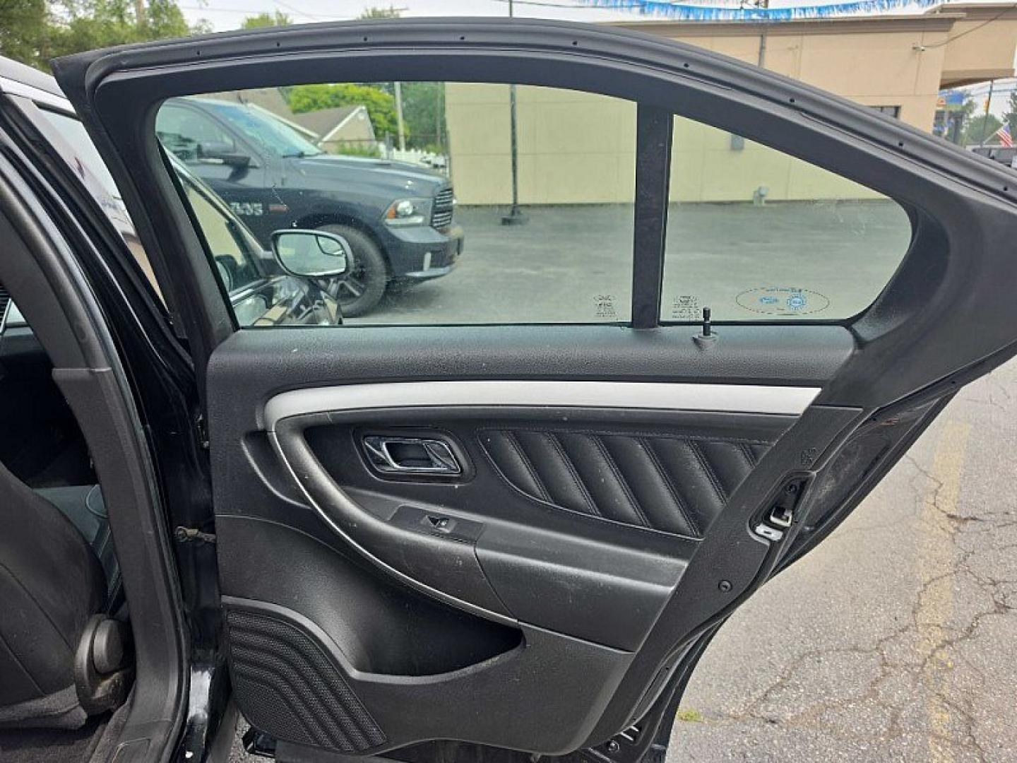 2018 BLACK /BLACK Ford Taurus SEL FWD (1FAHP2E83JG) with an 3.5L V6 DOHC 24V engine, 6A transmission, located at 3304 Woodville Road, Northwood, OH, 43619, (419) 210-8019, 41.612694, -83.480743 - Your #1 Destination for Auto Loans and mdash;No Matter Your Credit!At our dealership, we believe everyone deserves the opportunity to drive their dream car and mdash;whether you have good credit, bad credit, or no credit at all. With a wide selection of hundreds of cars, trucks, and SUVs, you'll fin- Photo#13