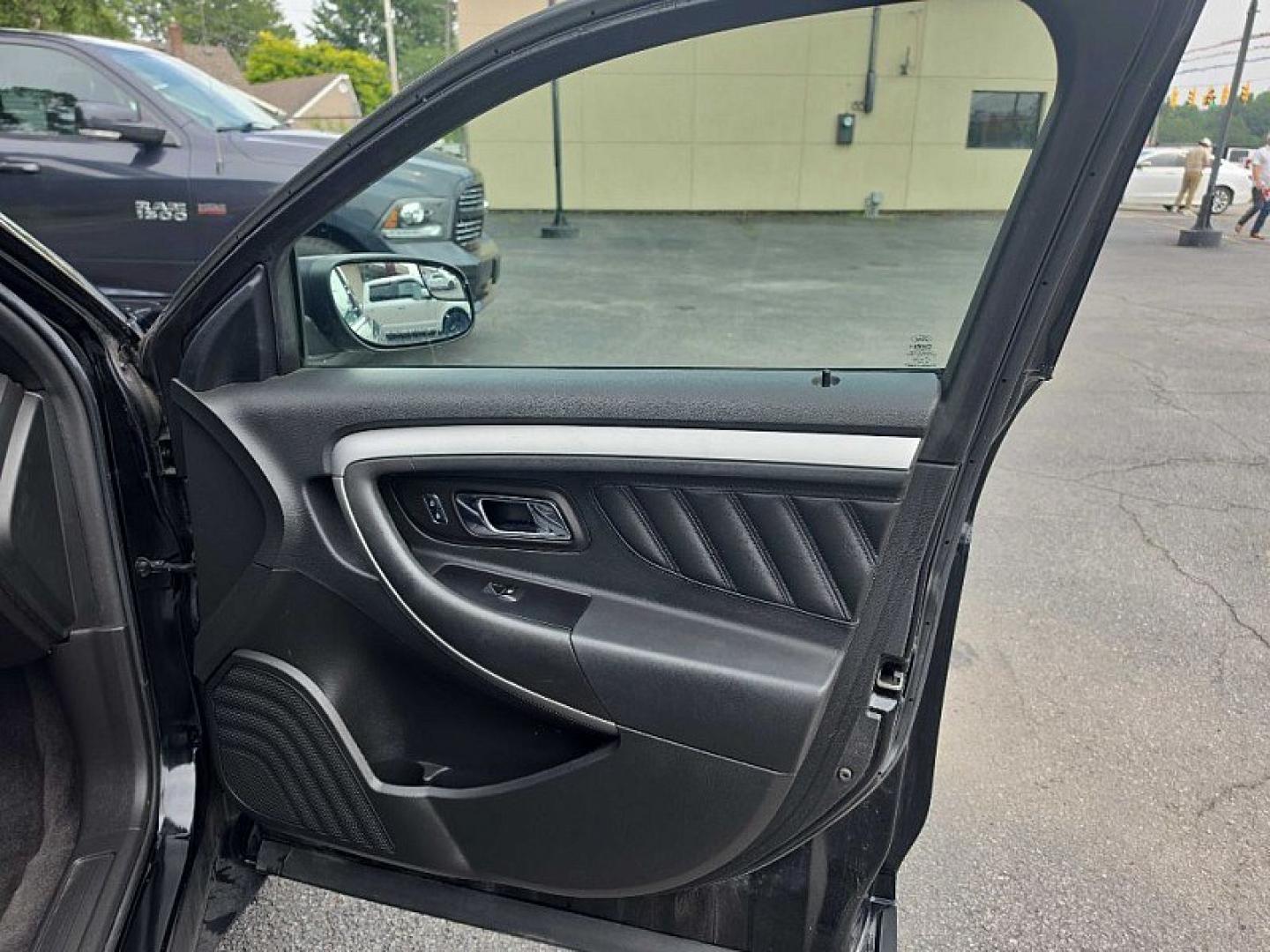 2018 BLACK /BLACK Ford Taurus SEL FWD (1FAHP2E83JG) with an 3.5L V6 DOHC 24V engine, 6A transmission, located at 3304 Woodville Road, Northwood, OH, 43619, (419) 210-8019, 41.612694, -83.480743 - Your #1 Destination for Auto Loans and mdash;No Matter Your Credit!At our dealership, we believe everyone deserves the opportunity to drive their dream car and mdash;whether you have good credit, bad credit, or no credit at all. With a wide selection of hundreds of cars, trucks, and SUVs, you'll fin- Photo#15