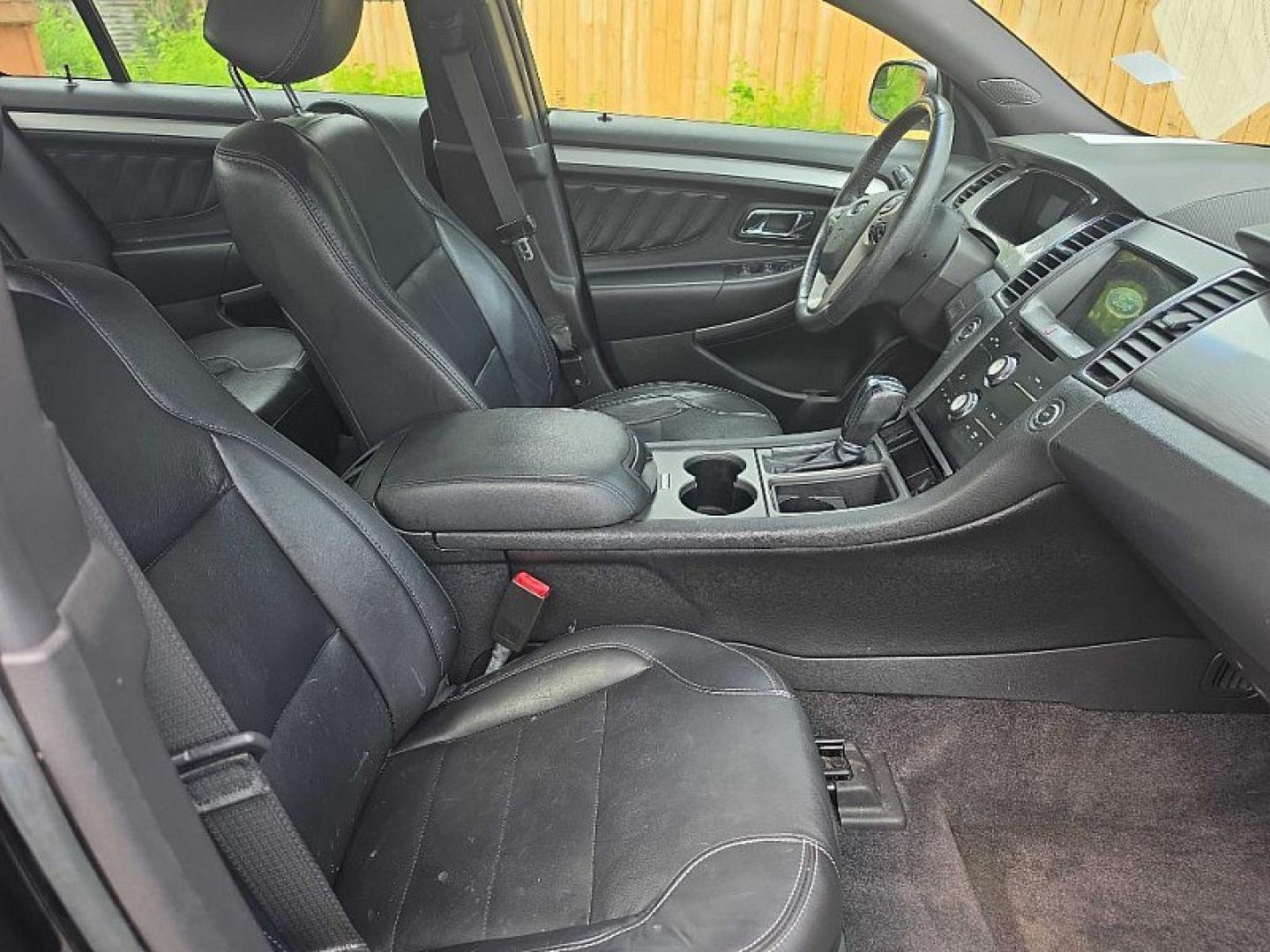 2018 BLACK /BLACK Ford Taurus SEL FWD (1FAHP2E83JG) with an 3.5L V6 DOHC 24V engine, 6A transmission, located at 3304 Woodville Road, Northwood, OH, 43619, (419) 210-8019, 41.612694, -83.480743 - Your #1 Destination for Auto Loans and mdash;No Matter Your Credit!At our dealership, we believe everyone deserves the opportunity to drive their dream car and mdash;whether you have good credit, bad credit, or no credit at all. With a wide selection of hundreds of cars, trucks, and SUVs, you'll fin- Photo#16