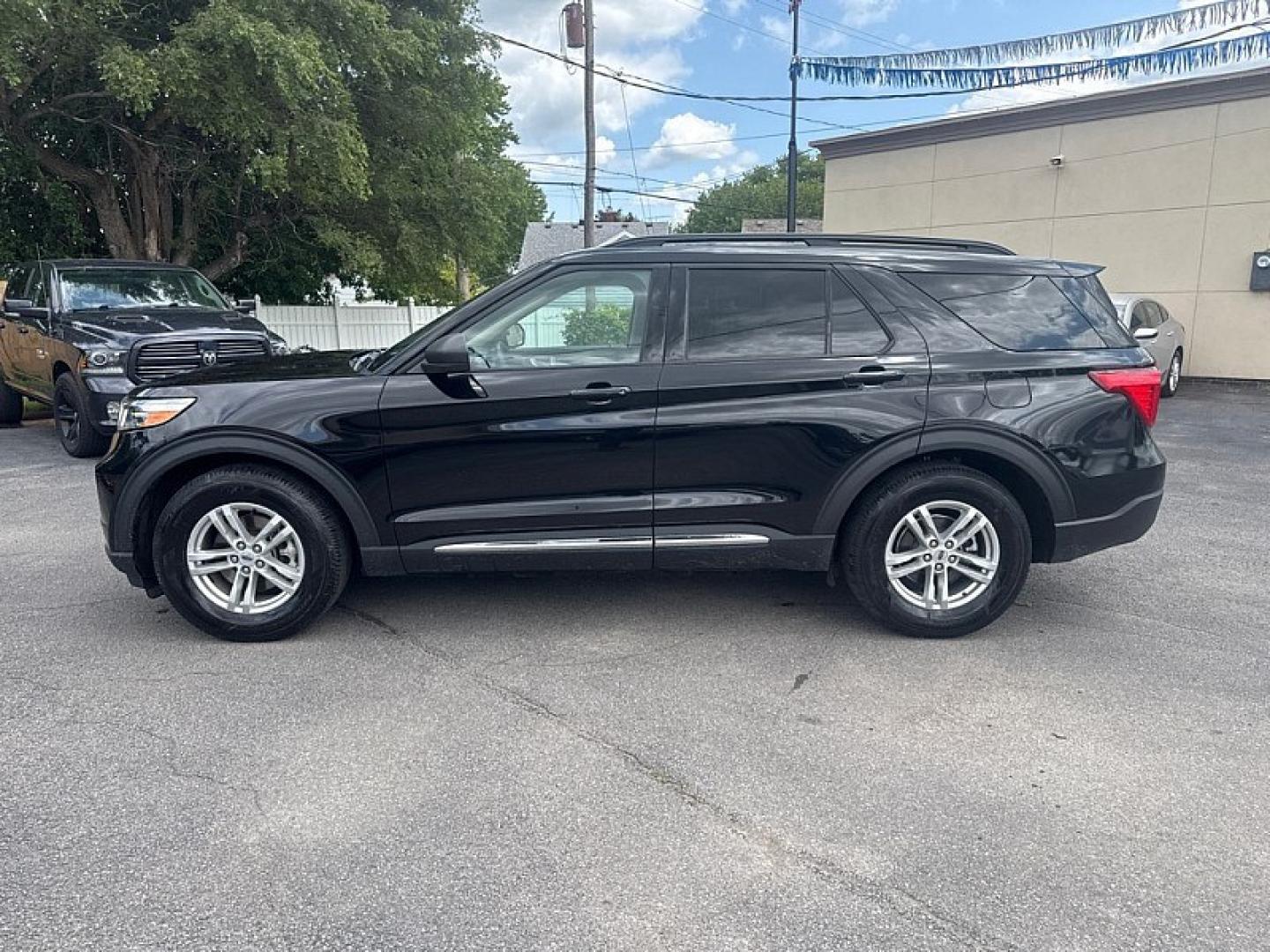 2023 BLACK /BEIGE Ford Explorer XLT (1FMSK7DH6PG) with an 2.3L L4 DOHC 16V engine, 10A transmission, located at 3304 Woodville Road, Northwood, OH, 43619, (419) 210-8019, 41.612694, -83.480743 - Your #1 Destination for Auto Loans and mdash;No Matter Your Credit!At our dealership, we believe everyone deserves the opportunity to drive their dream car and mdash;whether you have good credit, bad credit, or no credit at all. With a wide selection of hundreds of cars, trucks, and SUVs, you'll fin- Photo#1